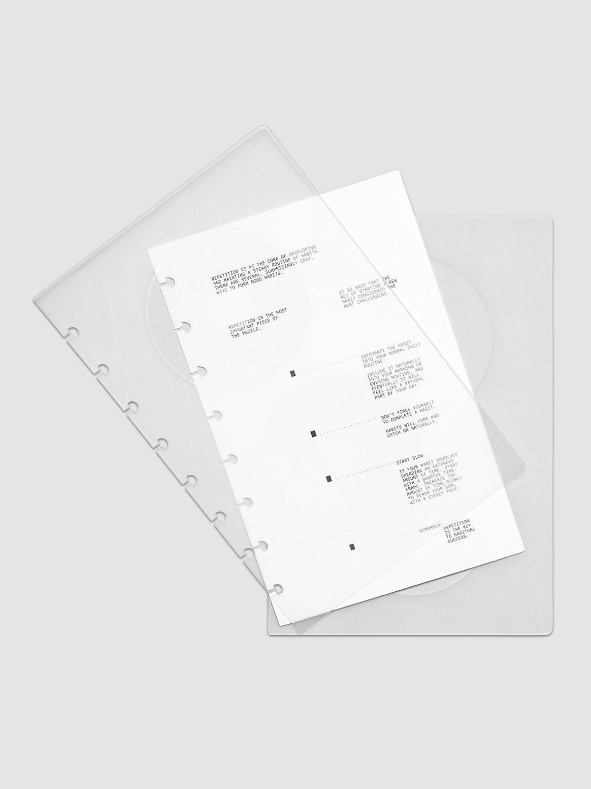 On Repeat Planner Cover + Dashboard Set  shown fanned out in size Half Letter, pre-punched for discbound notebooks and planners.