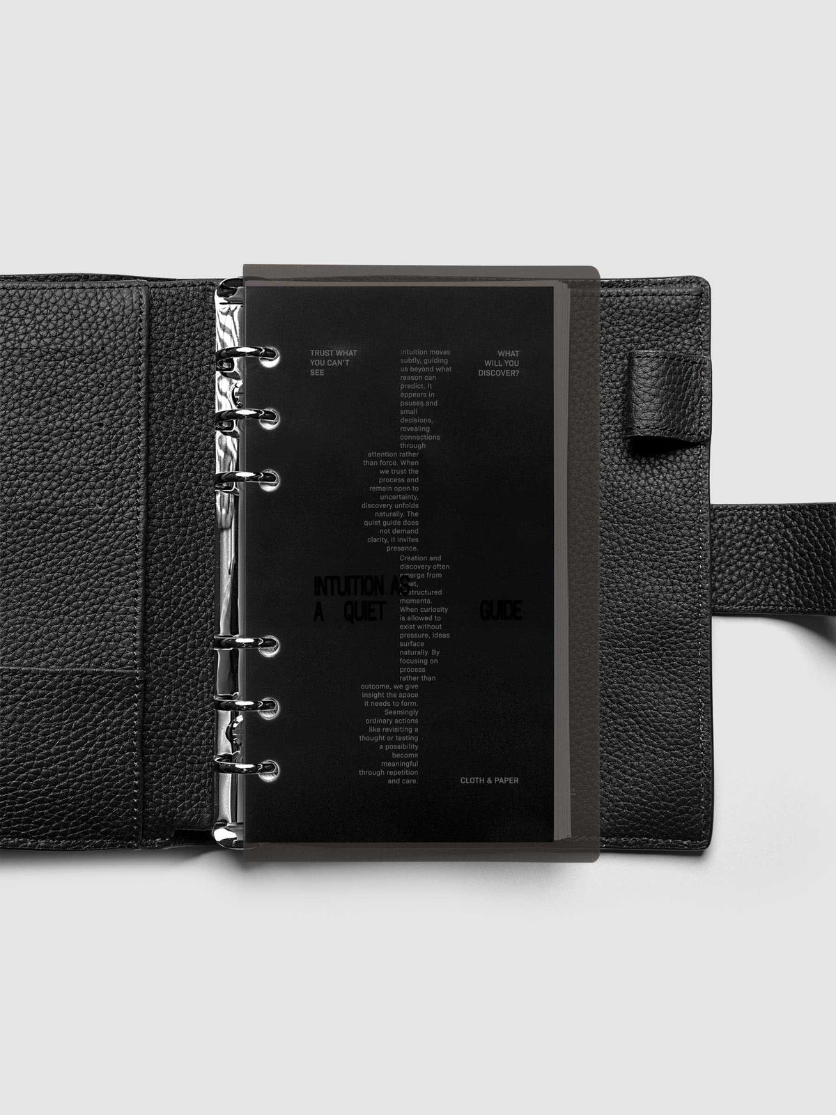 Black Intuition Ultra Thin Planner Cover + Dashboard Set in size Personal 6-Ring shown inside a planner