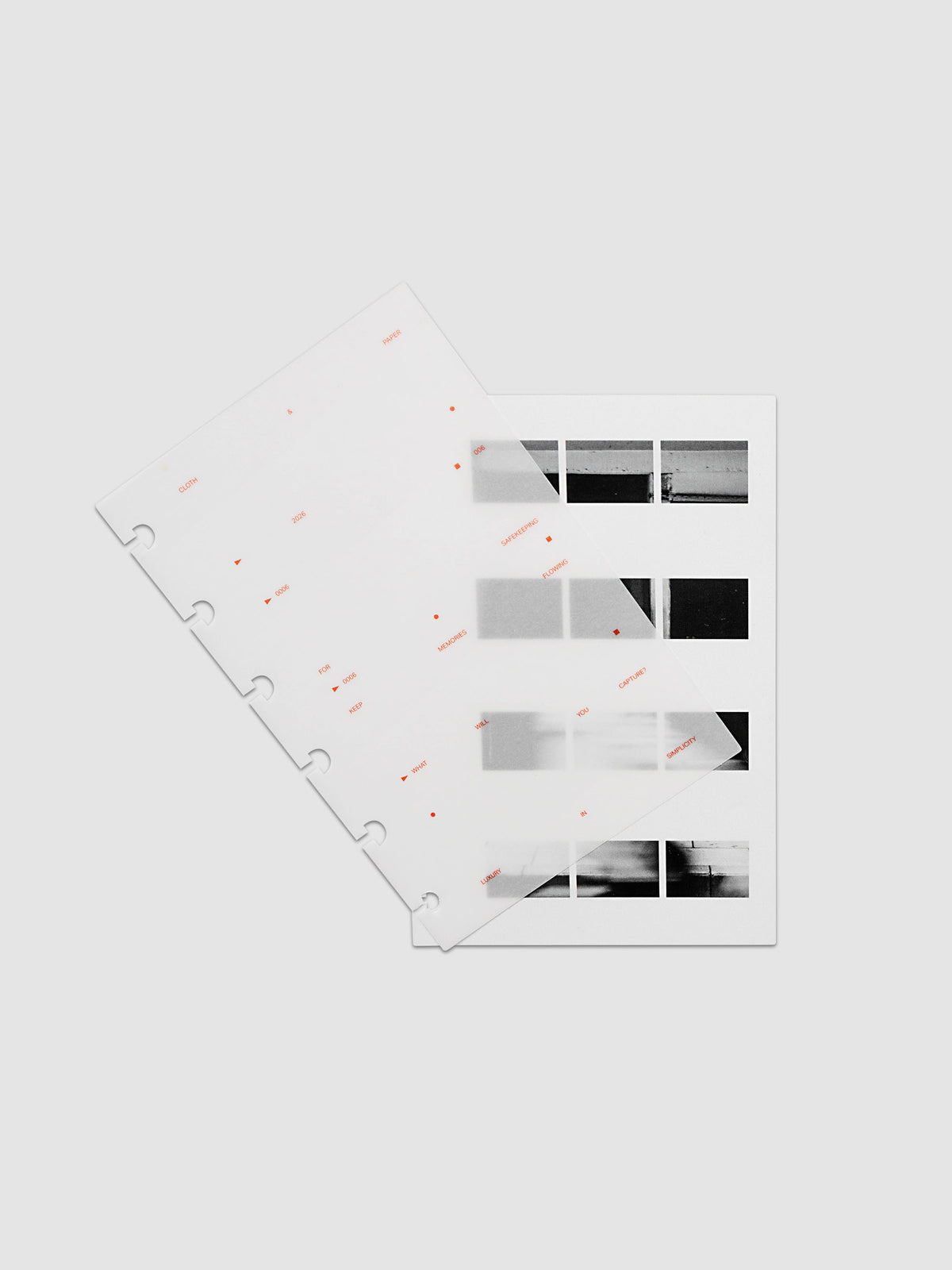 Film Strip Planner Dashboard Duo CP Petite 6-Disc Punch 6-Ring Punch two dashboards offset showing layered vellum and film strip plastic with deep orange printed details