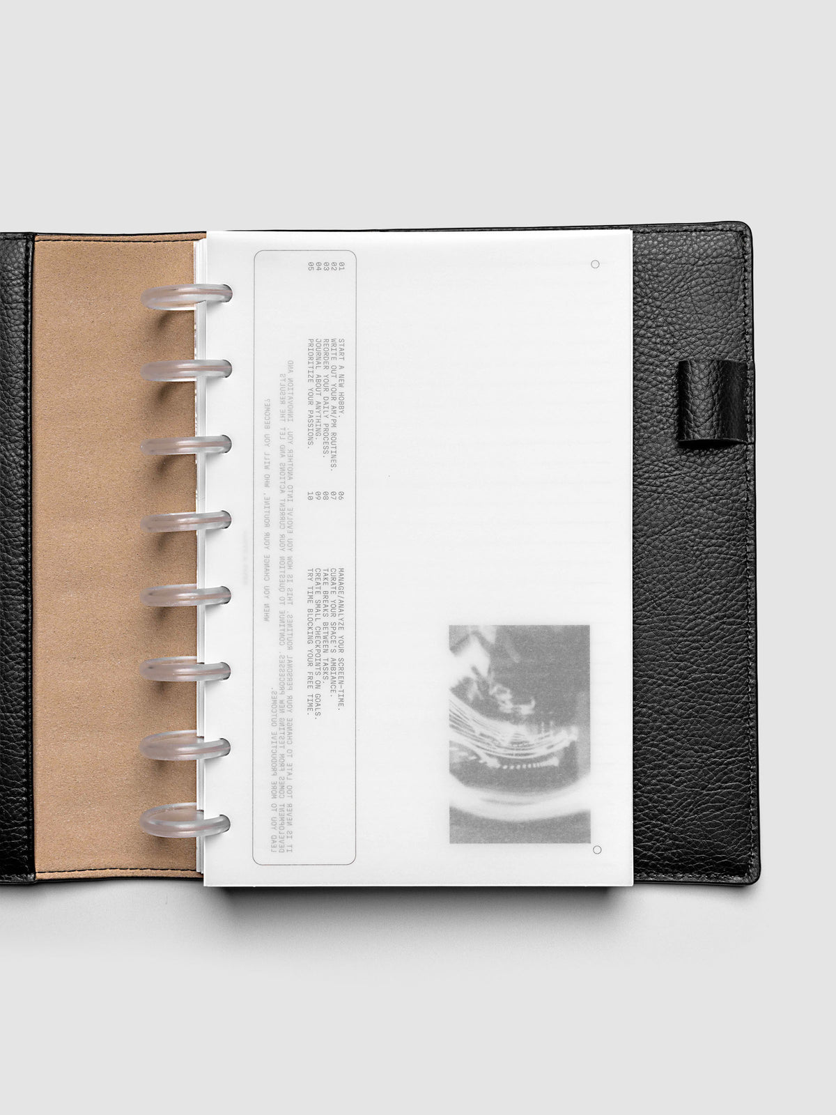 Side A & Side B Planner Dashboard in size Half Letter shown in a black folio.