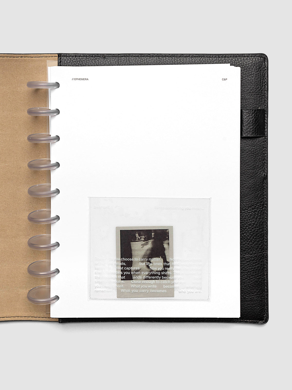 White Ephemera Planner Dashboard shown in size HP Classic in a black leather folio.