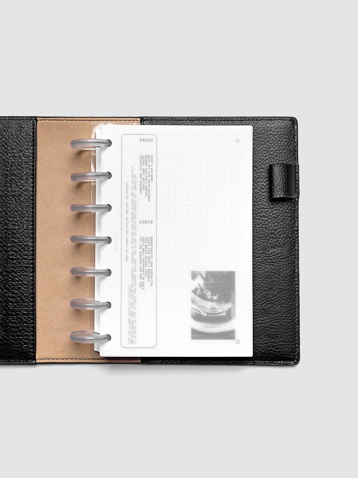 Side A & Side B Planner Dashboard in size HP Mini shown in a black folio.