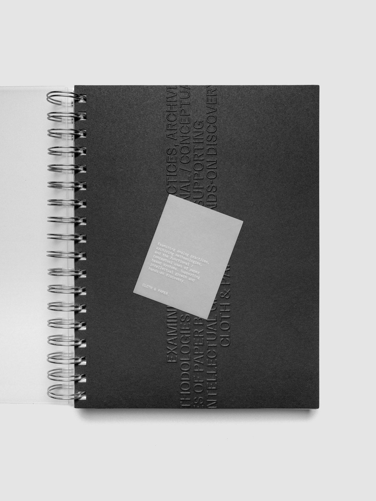 Black embossed Analog Embossed Planner Dashboard with drop card shown in size HP Classic Spiral.