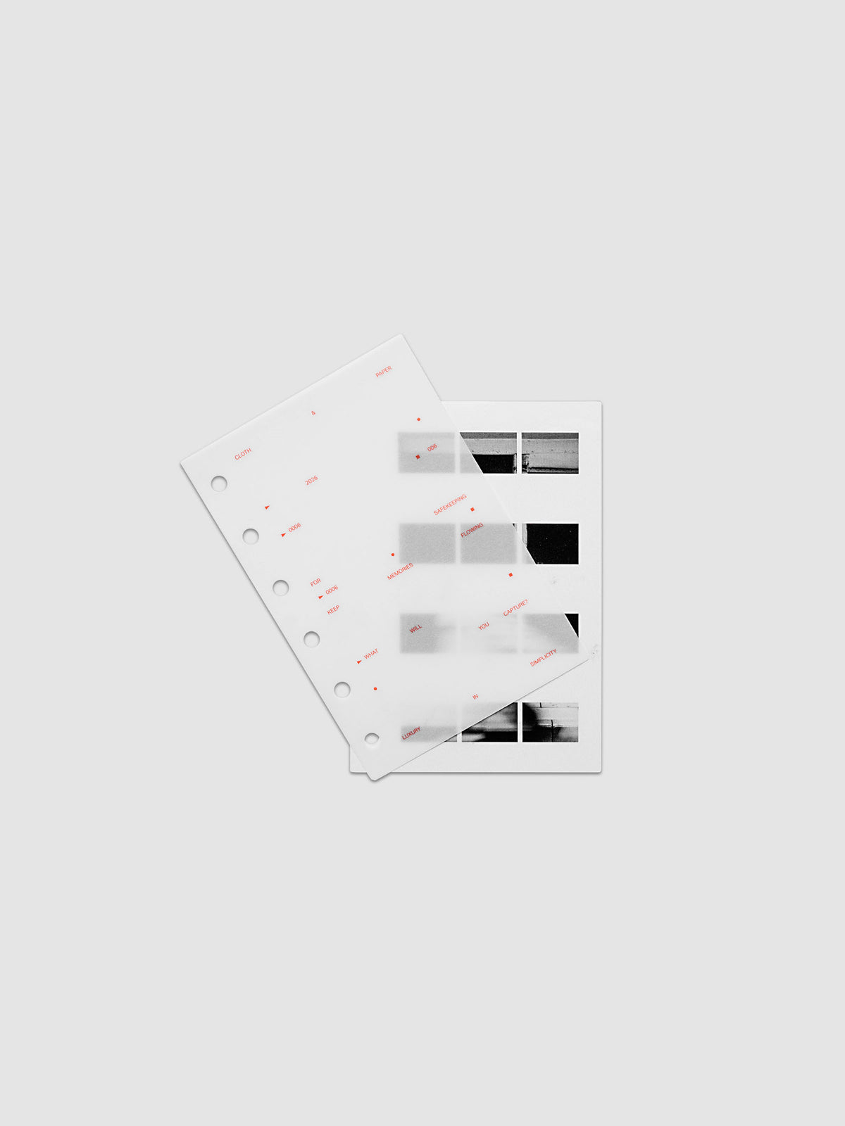 Film Strip Planner Dashboard Duo Pocket 6-Ring Punch two dashboards offset showing layered vellum and film strip plastic with deep orange printed details