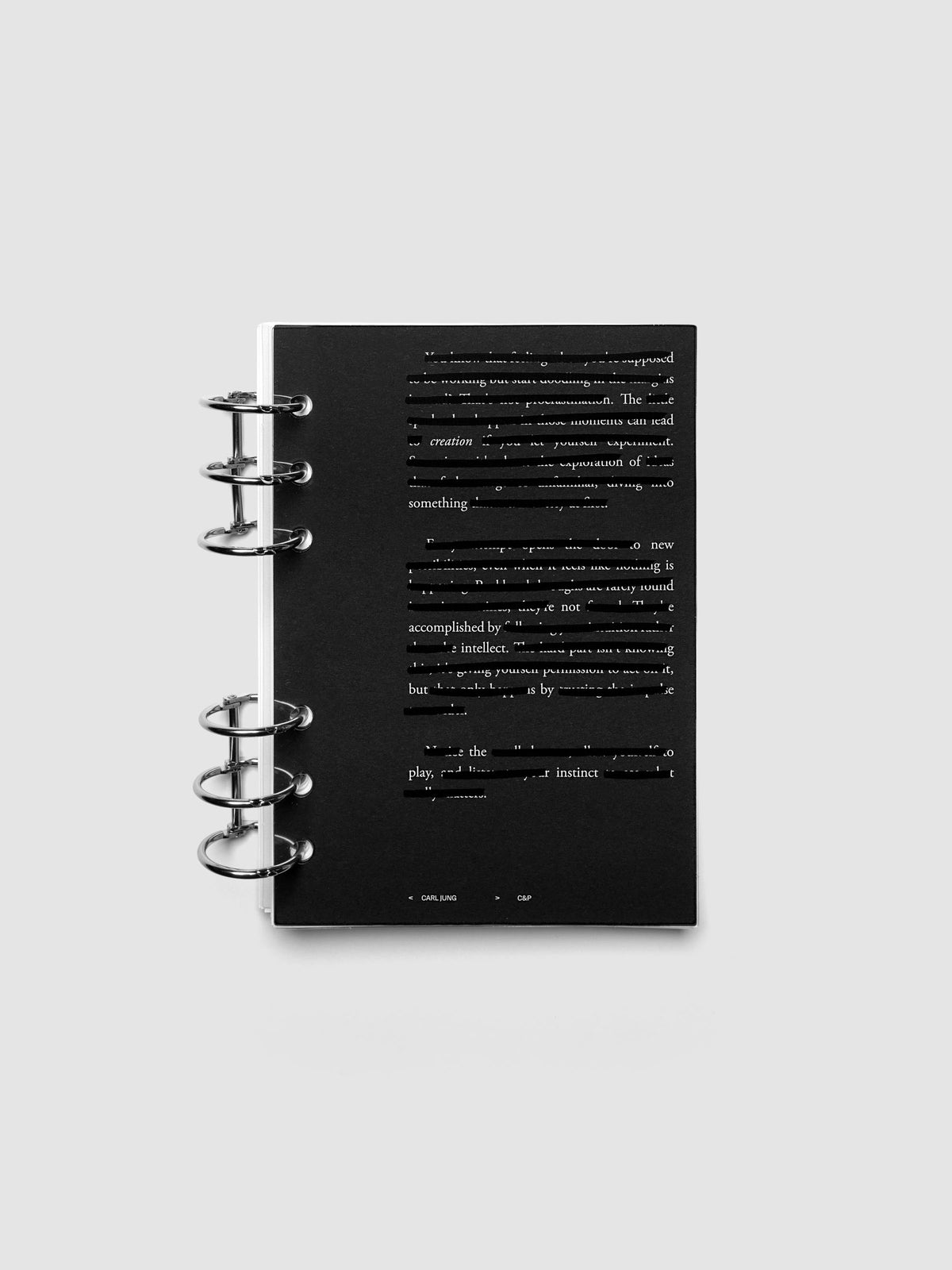 Black, white, and transparent dual layer planner dashboard shown in size Personal Wide 6-Ring Punch inside a planner
