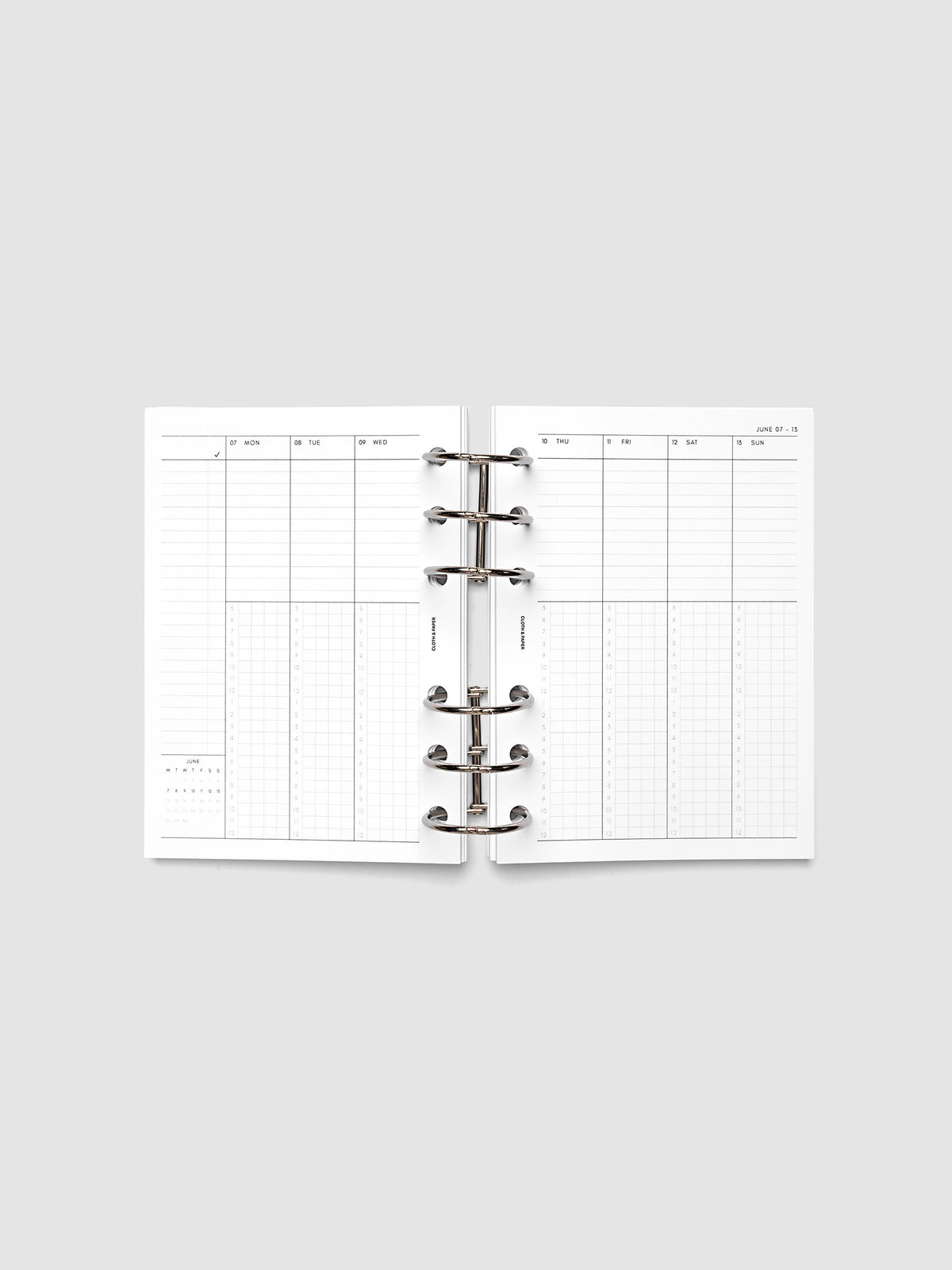 A6 6-Ring Punch weekly time block spread showing left and right pages in a planner