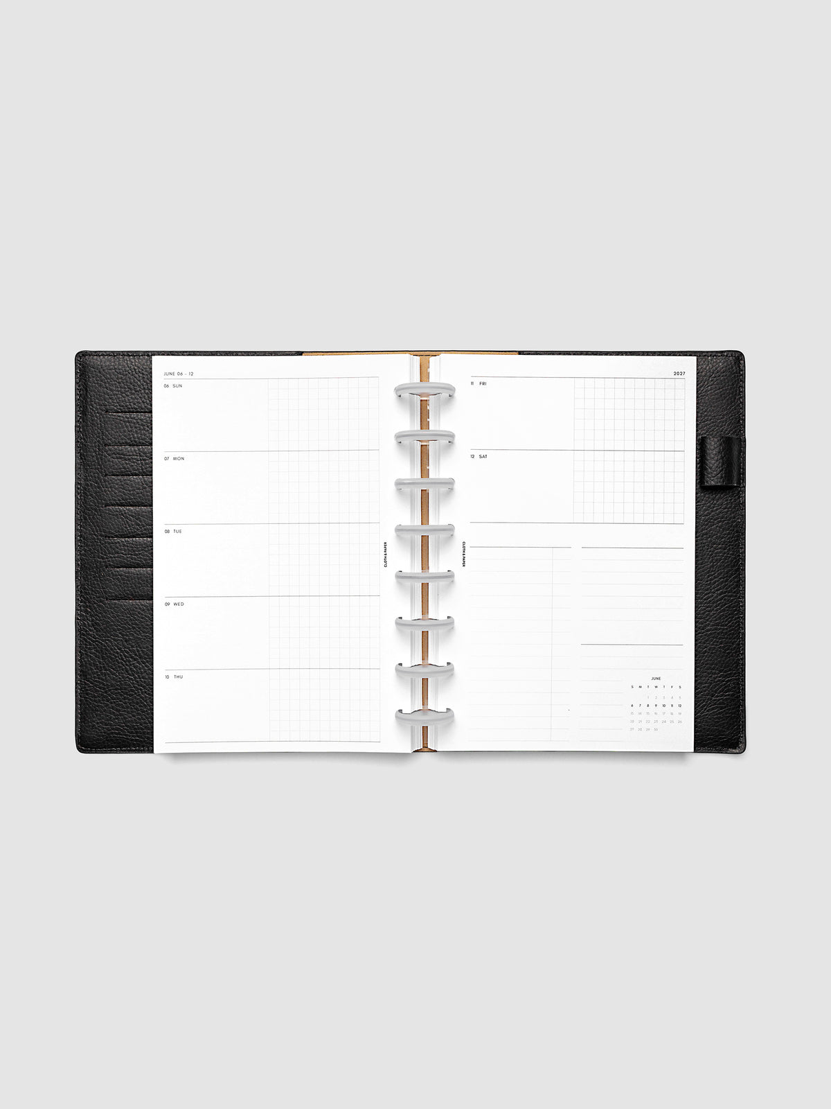 2027 Dated Weekly Horizontal Planner Inserts, Sunday Start, Half Letter 8-Disc Punch, full week-on-two-pages horizontal spread showing each day split into open and graph columns, with tasks column, notes column, and mini monthly calendar on the right page, shown inside a planner