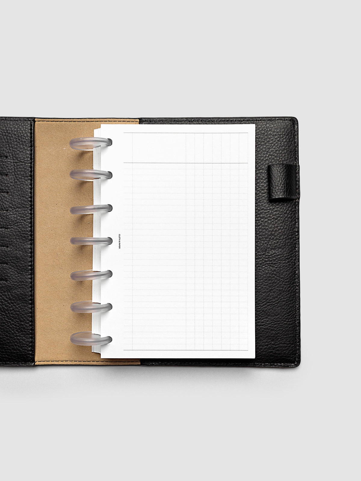 Inbox Sorting Planner Inserts shown pre-punched for discbound HP Mini planners in a black folio.