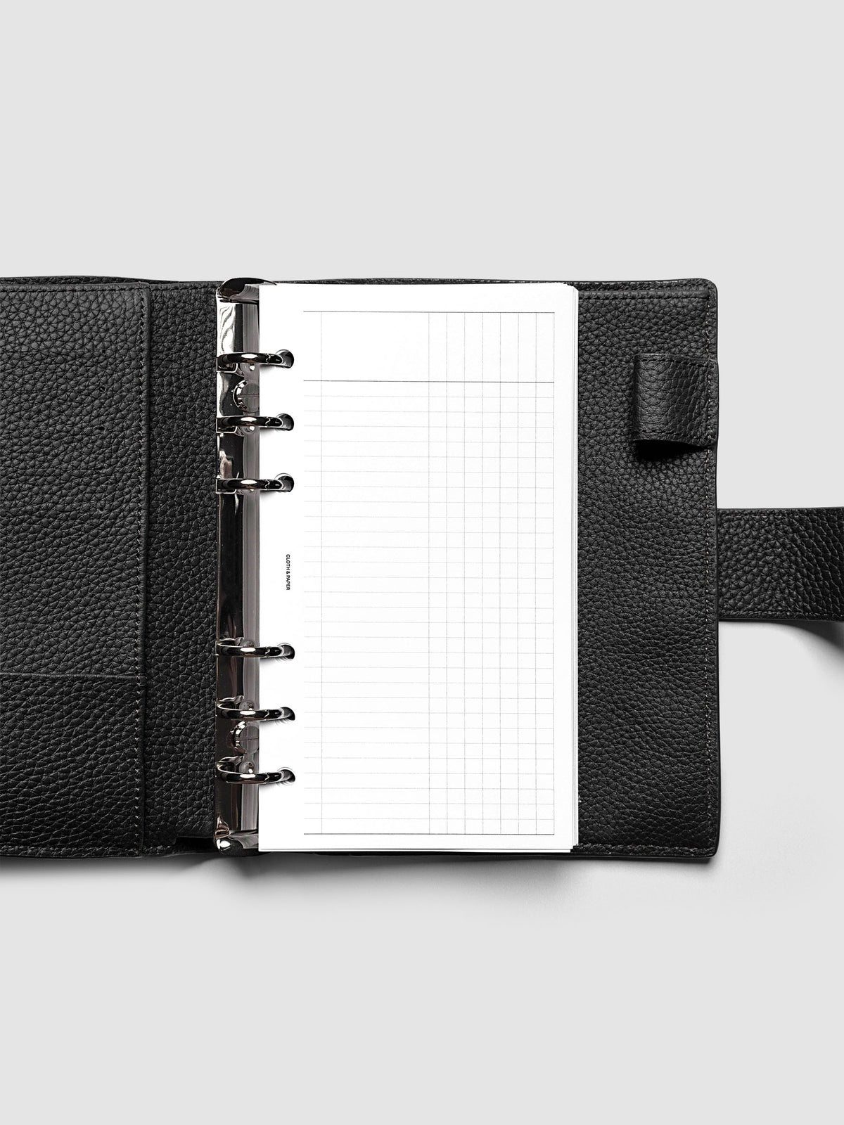 Inbox Sorting Planner Inserts shown pre-punched for 6-Ring Personal planners in a black agenda.
