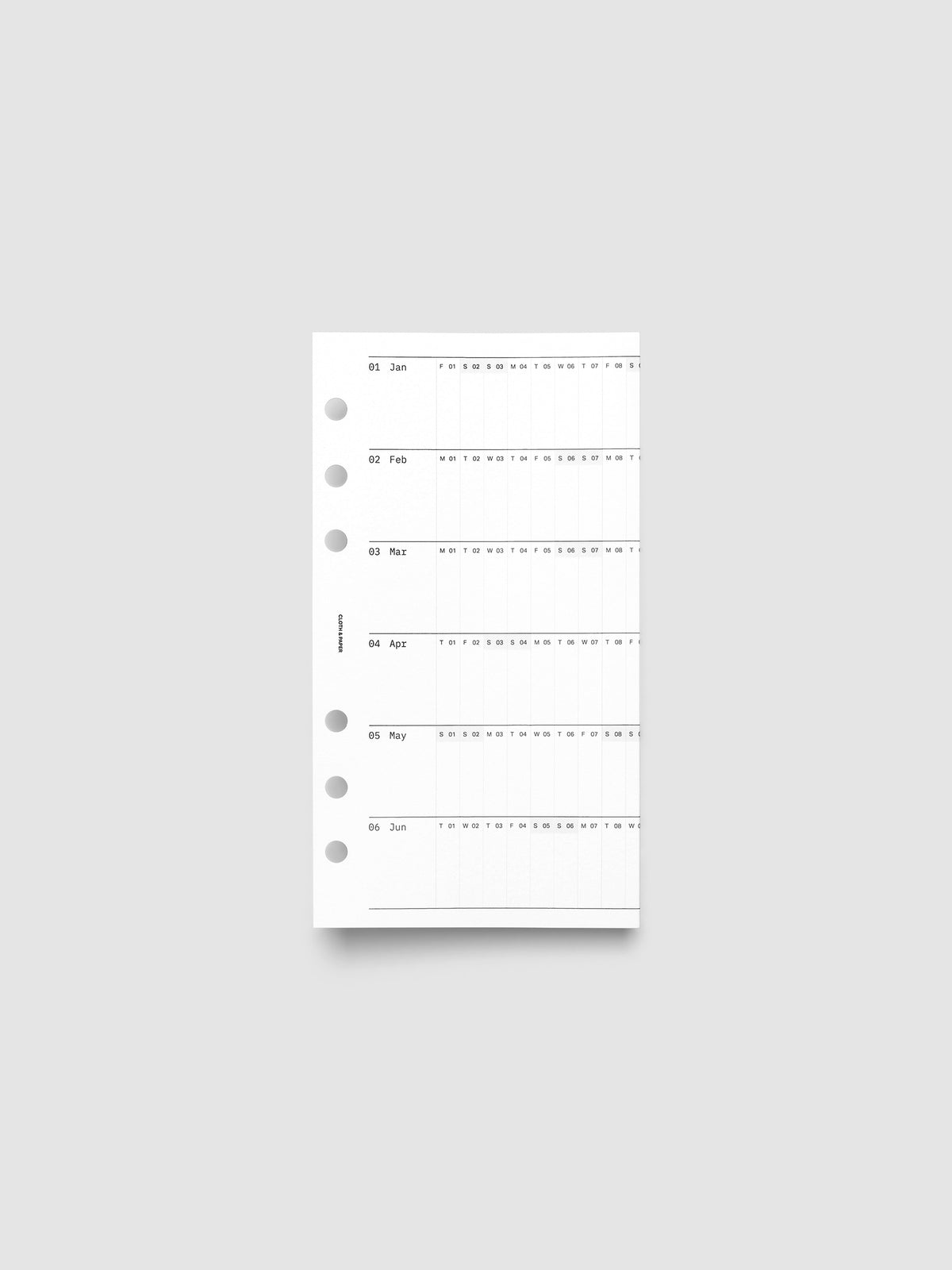 Personal 6-Ring Punch 2027 Dated Fold Out Insert shown folded closed, displaying the cover side on a flat surface.