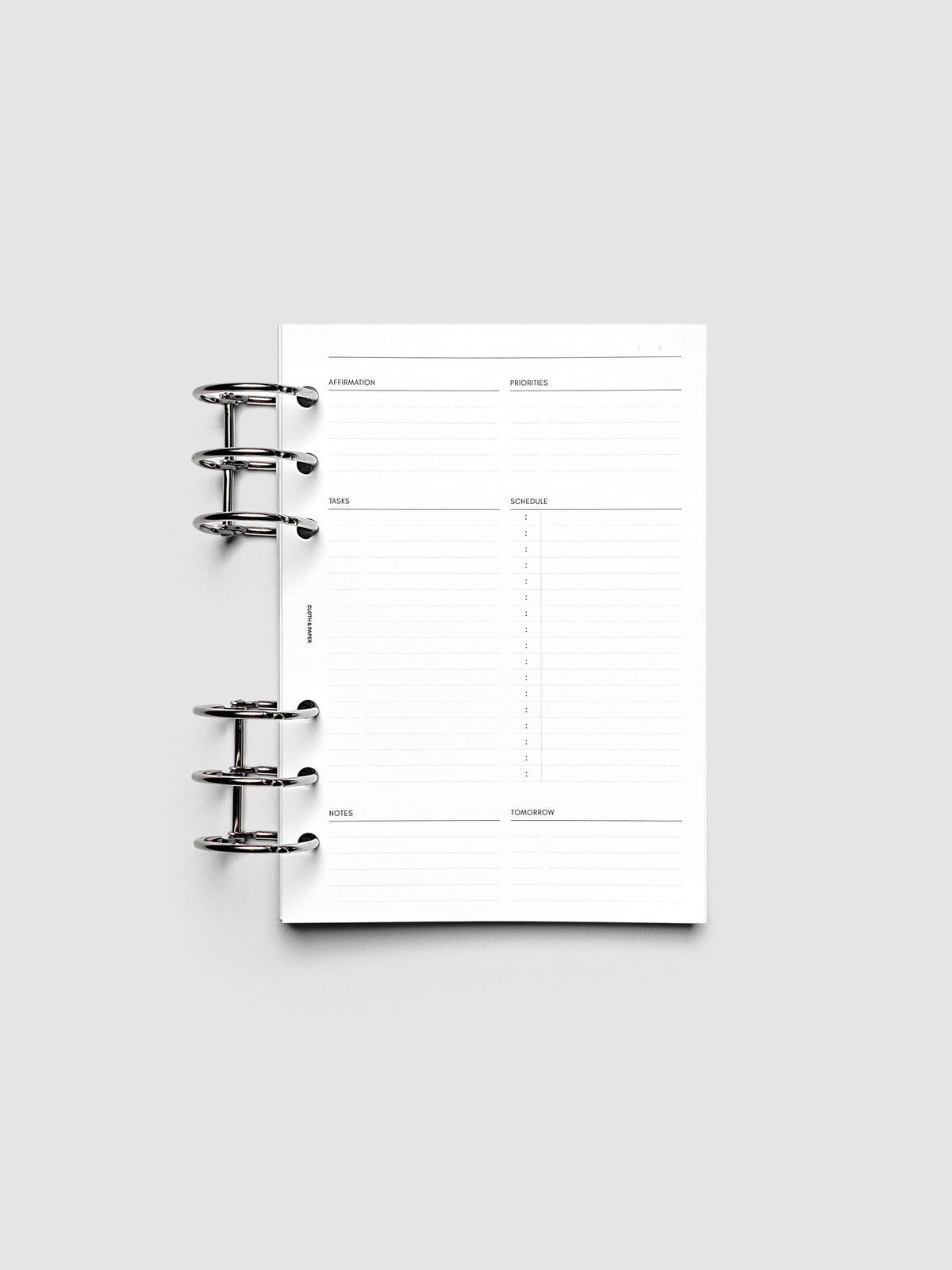 Daily Essentials Planner Inserts shown ring bound in size Personal Wide.