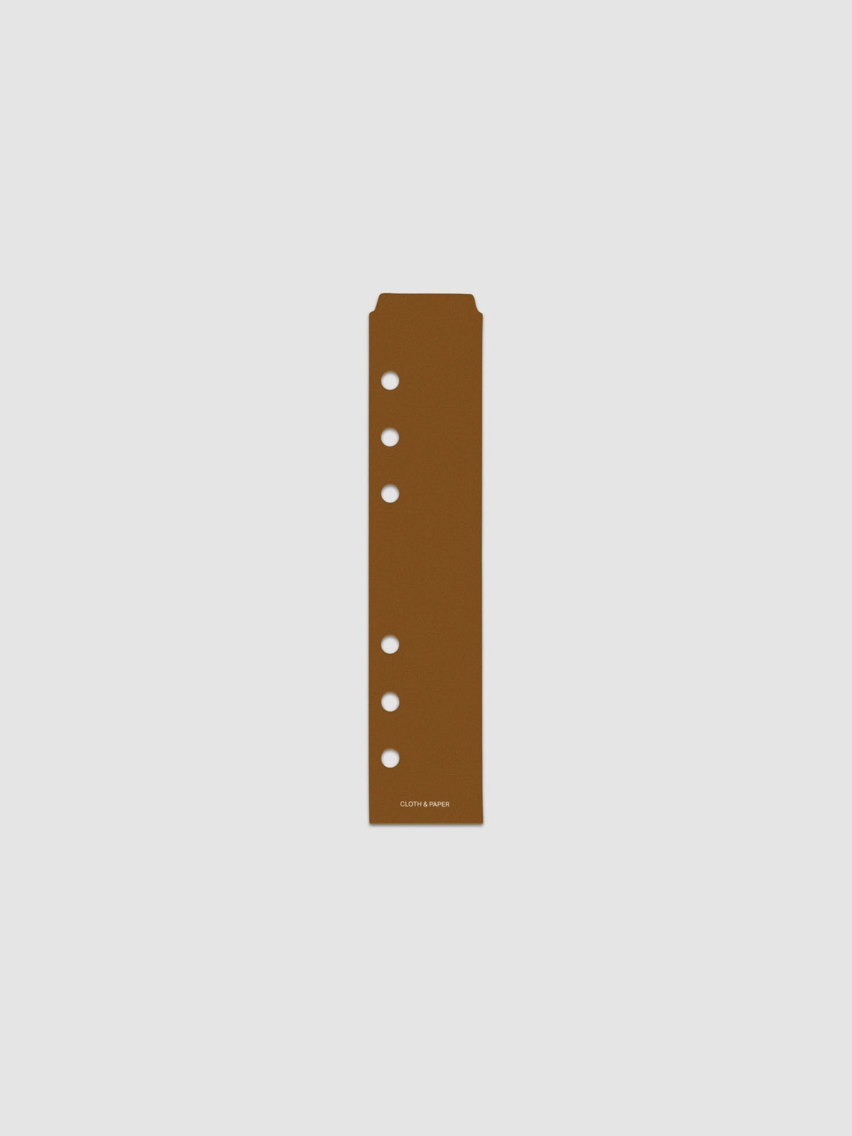 One narrow page marker in brown, shown in size Personal/Personal Wide.
