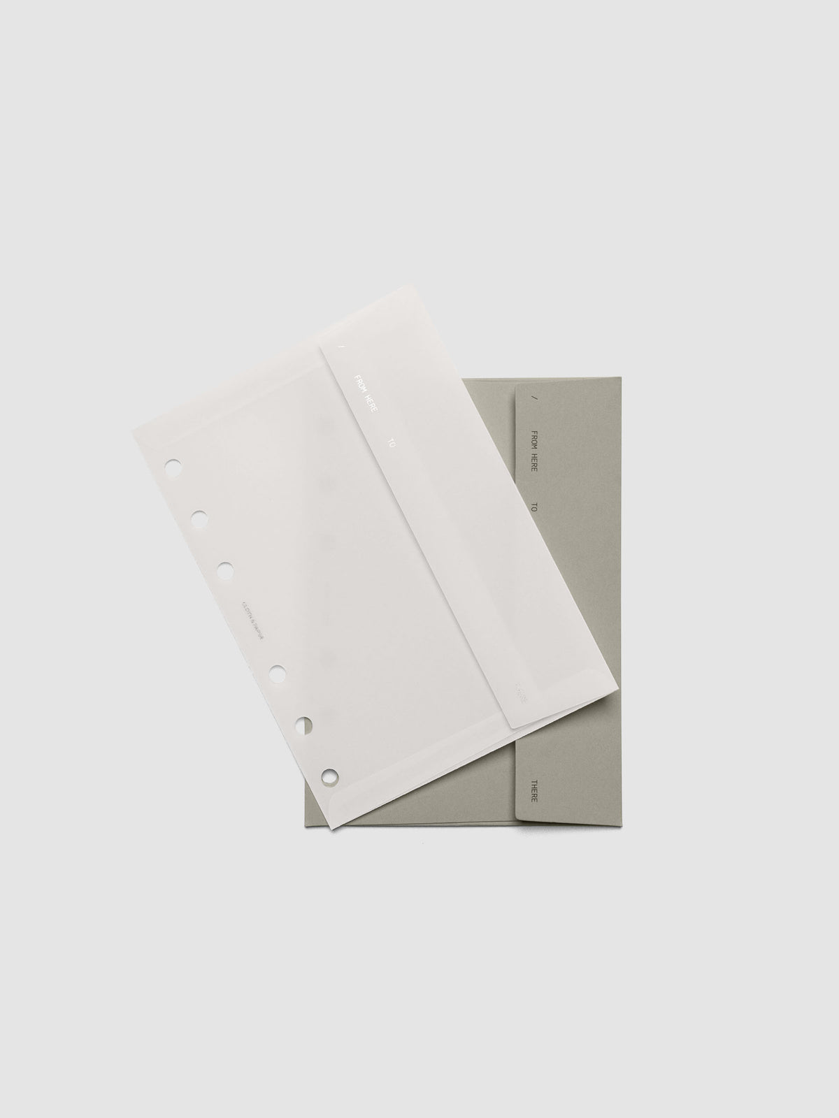 Envelope Storage Holder Set shown pre-punched for A6 6-Ring planners.