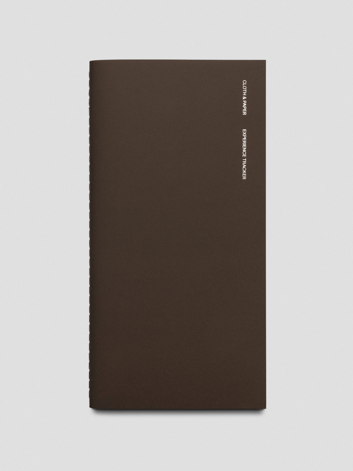 Travel Notebook A5 Slim Experience Tracker dark brown cover with silver foil text