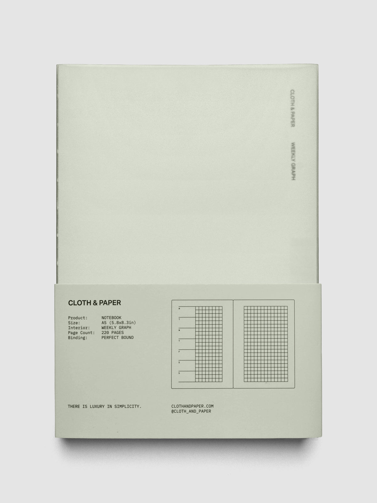 Perfect Bound Notebook | A5 | Weekly Agenda | Matcha shown closed, laying flat, in packaging on a neutral background.