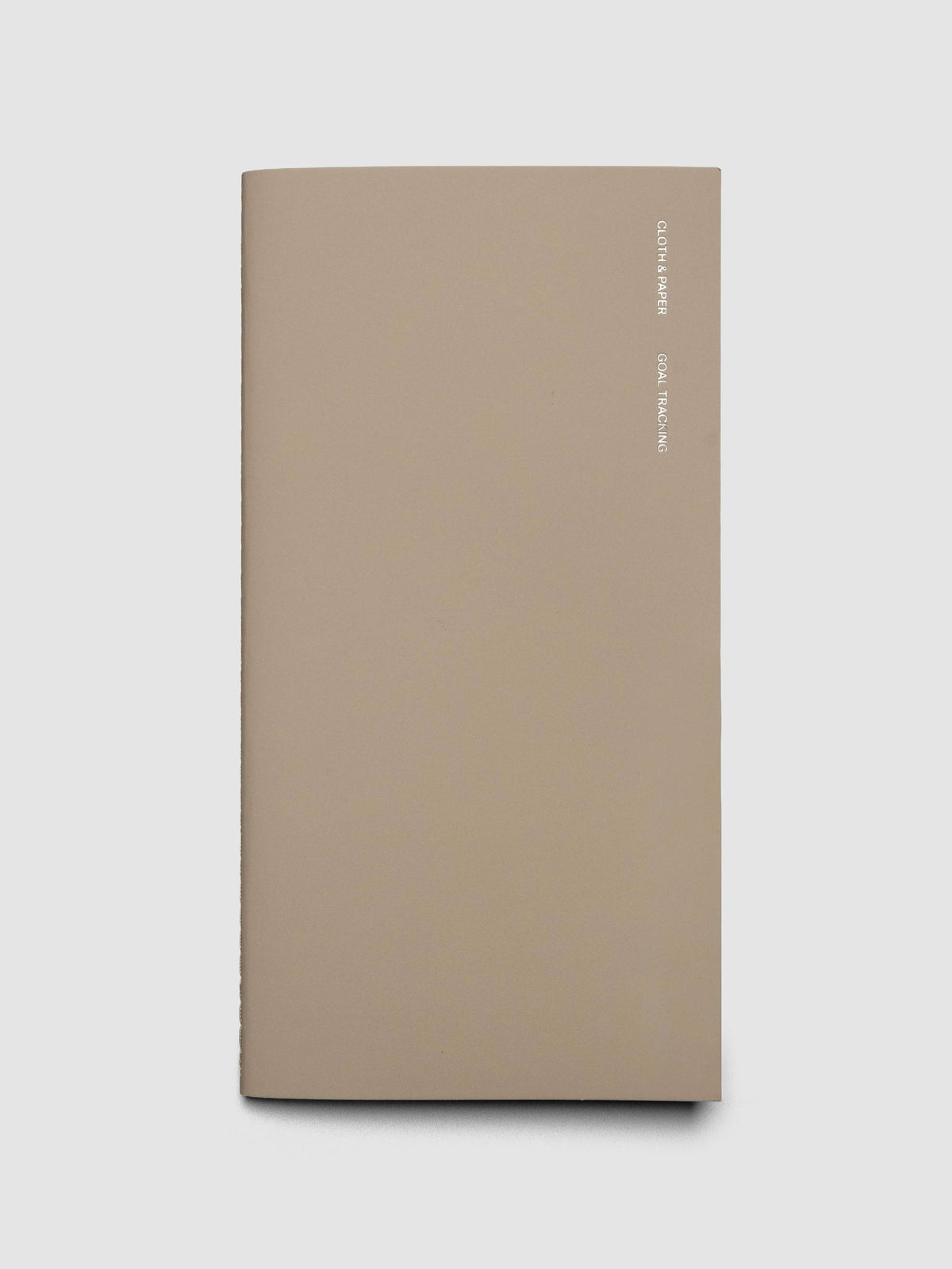 Travel Notebook in size A5 Slim in color Ibiza with Goal Tracking pages shown closed.