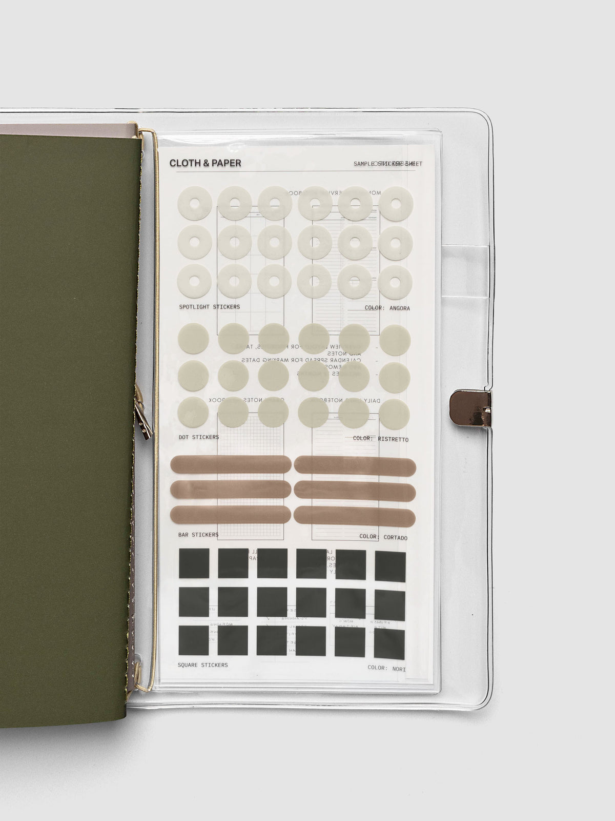 A pocket plus sized sticker sheets with spotlight, dot, bar, and square stickers in various colors.