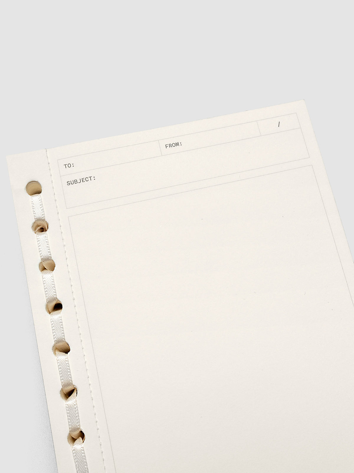Close up of the Message Pad showing headers for to, from, date, and subject.