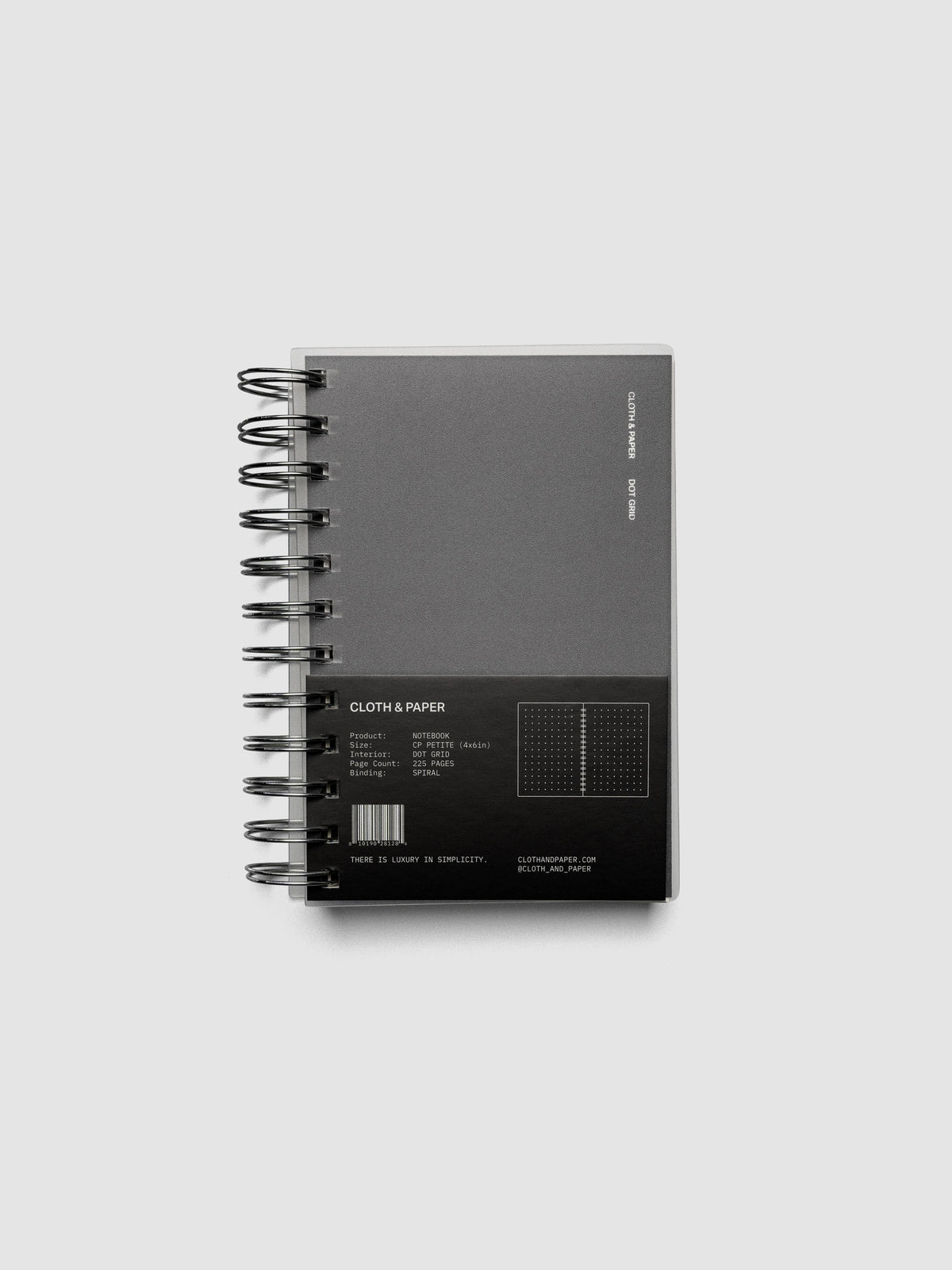 Spiral Notebook in size CP Petite and color Avant Garde with Dot Grid interior pages shown closed from the front with belly band.