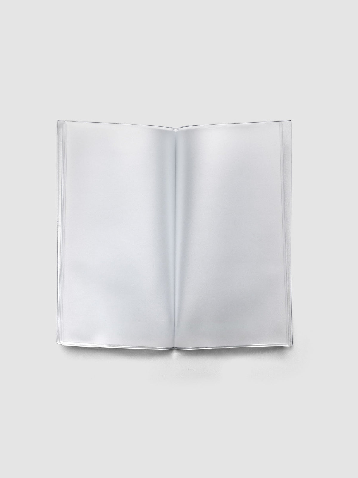 Pocket Plus sized clear organizer with sticker sheets placed in a pocket.