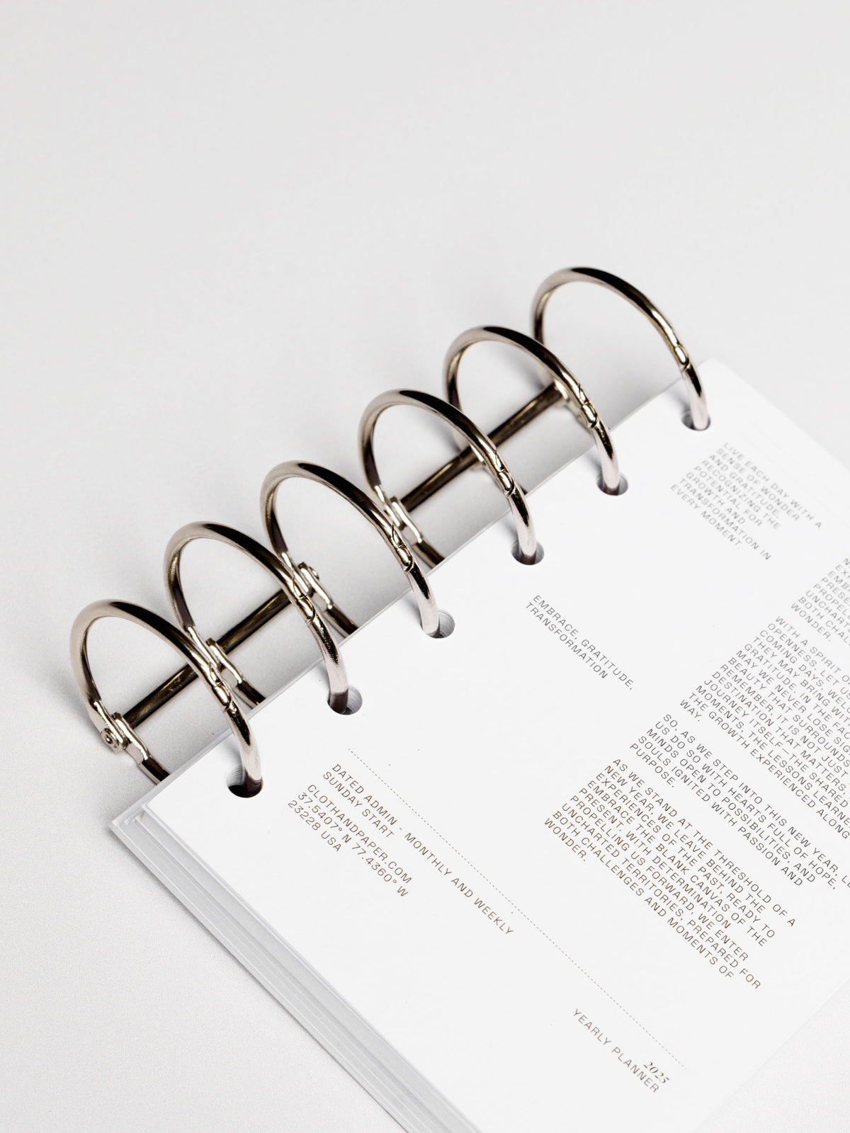 Planner rings displayed in a planner system on a neutral background. Color shown is silver.