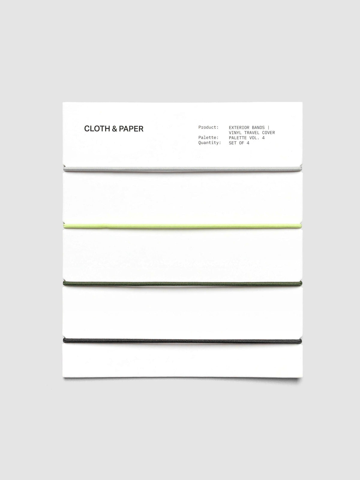 Set of four exterior elastic cover bands—grey, green, and black—on packaging card.