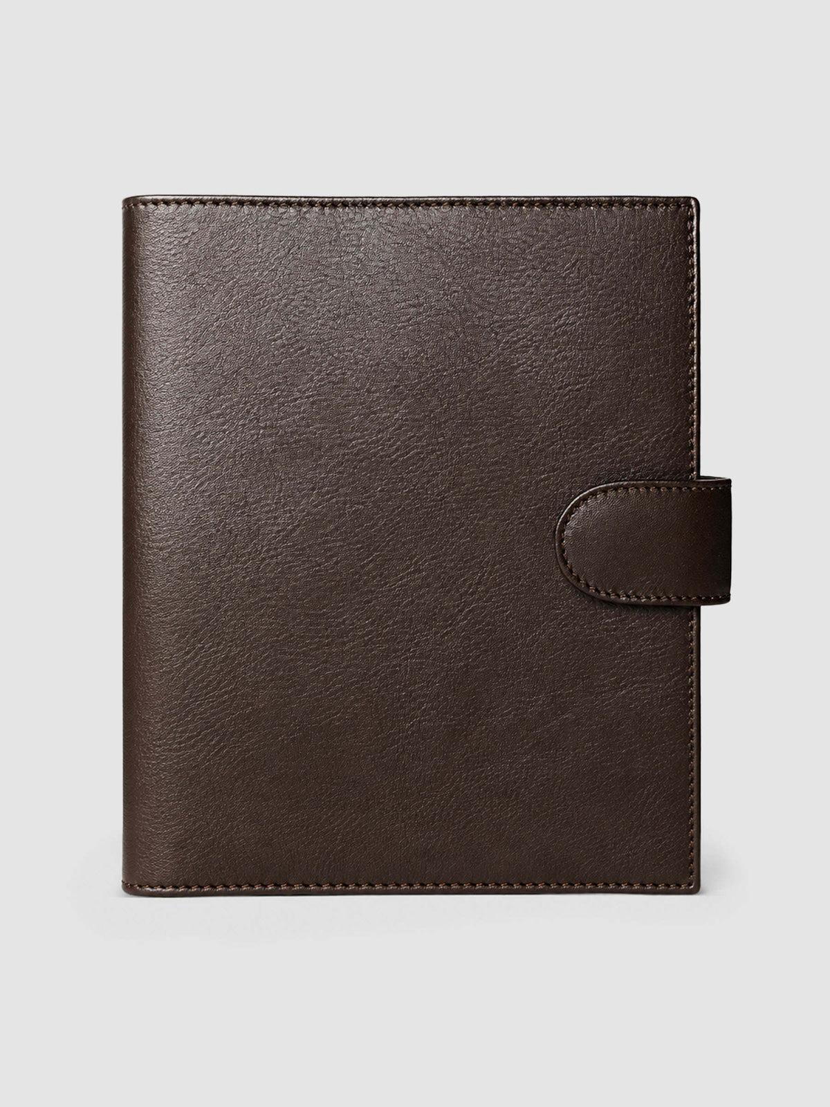 Dark brown genuine leather A5 6-ring planner cover with gold magnetic snap closure, closed front view
