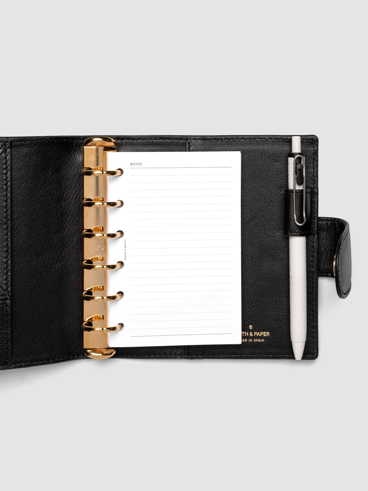 Heirloom Ring Cover Genuine Leather Pocket 6-Ring Punch in black, planner cover open with pages inside