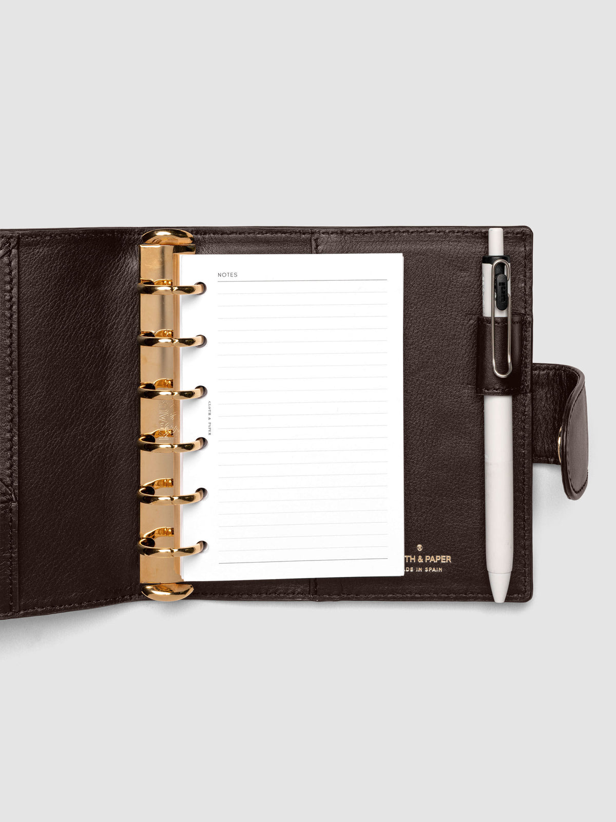 Heirloom Ring Cover Genuine Leather Pocket 6-Ring Punch in dark brown, planner cover open with pages inside