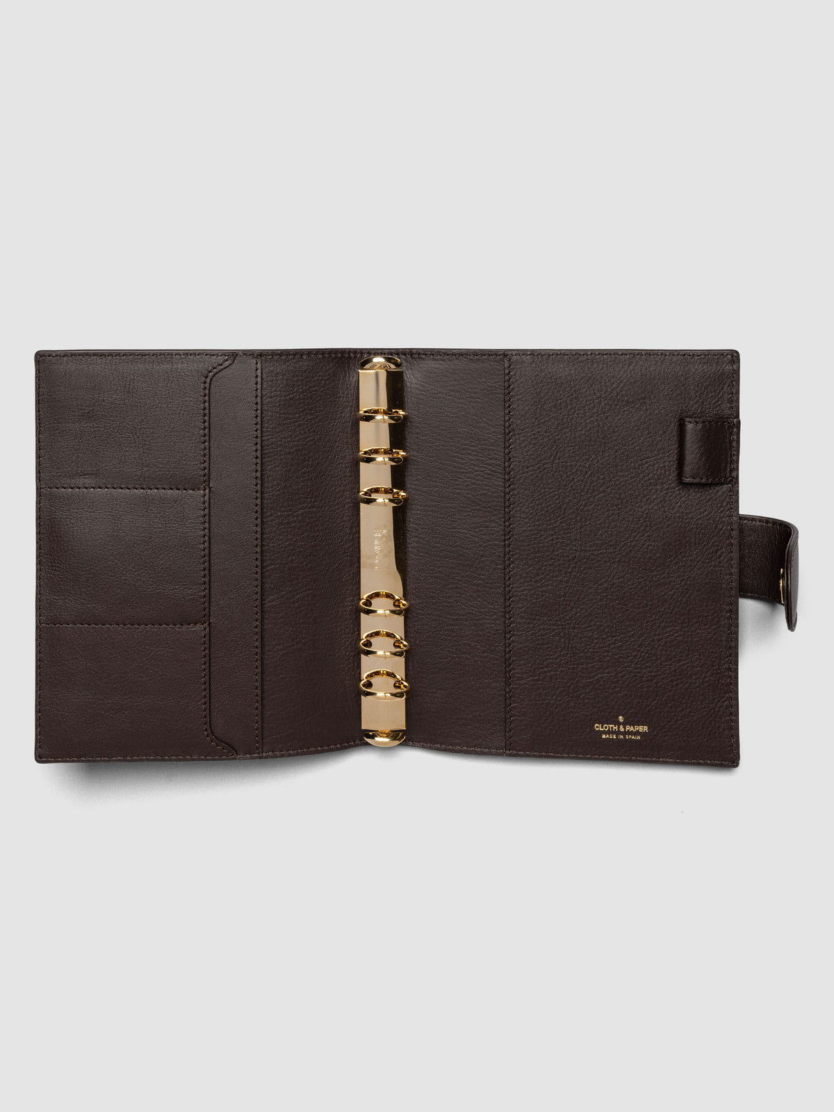 Open dark brown genuine leather Personal Wide 6-ring planner cover showing full interior, gold Krause rings and pockets visible on both sides
