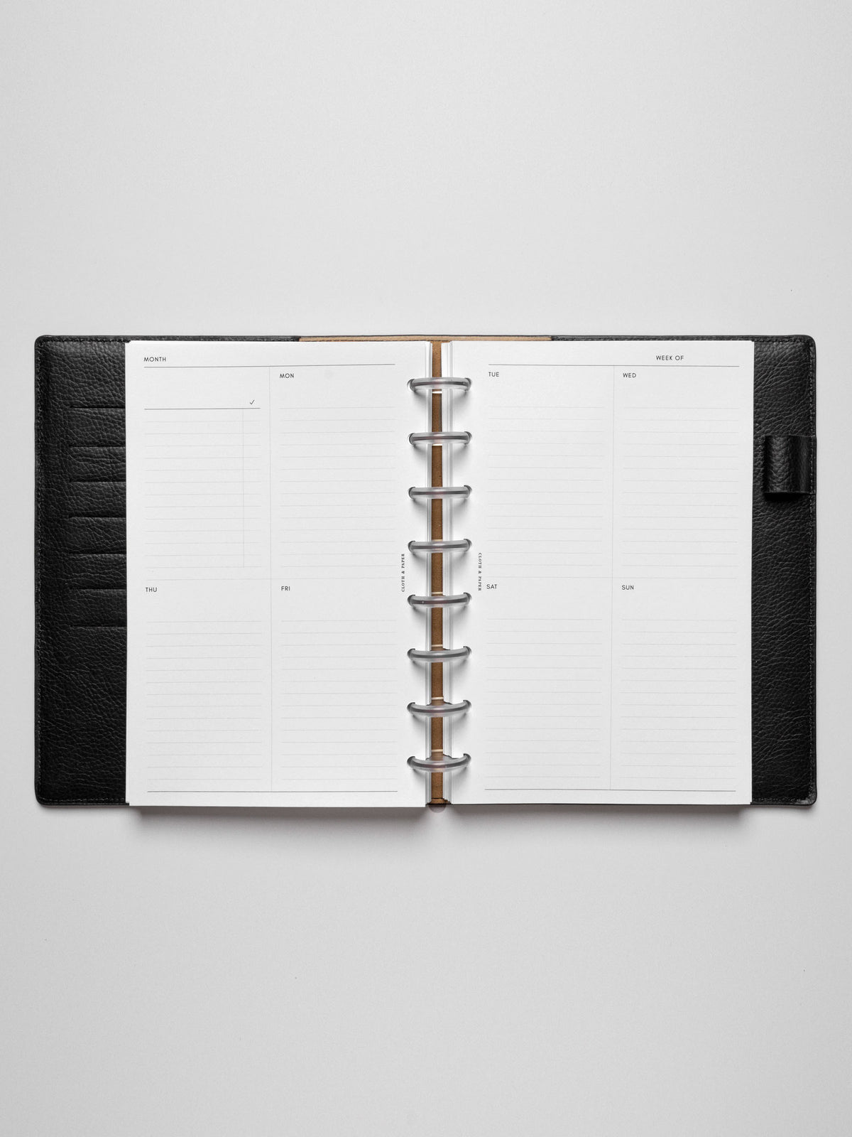 Half Letter insert in use inside a leather planner.