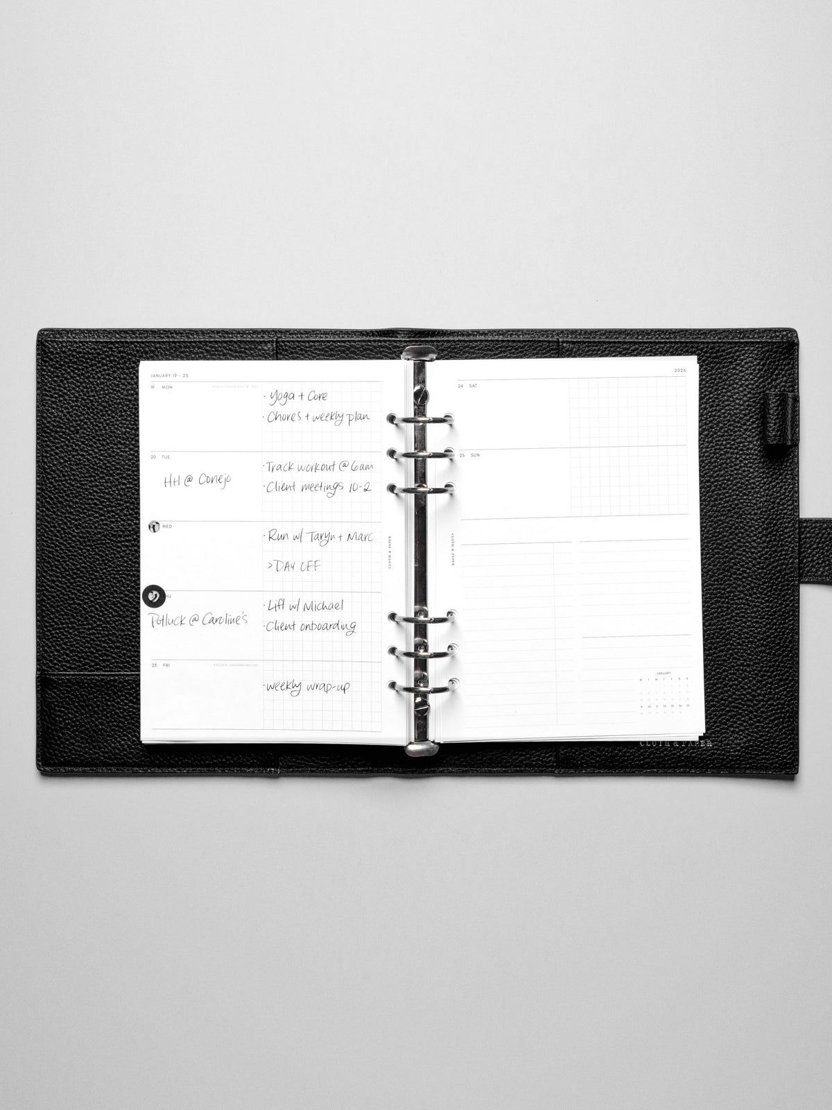 Inserts in use inside a leather planner.