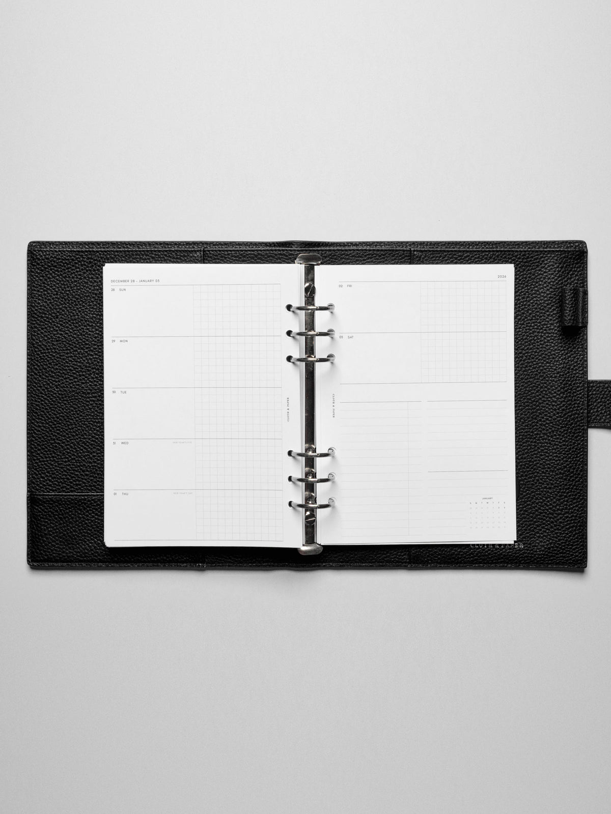 Inserts in use inside a leather planner.