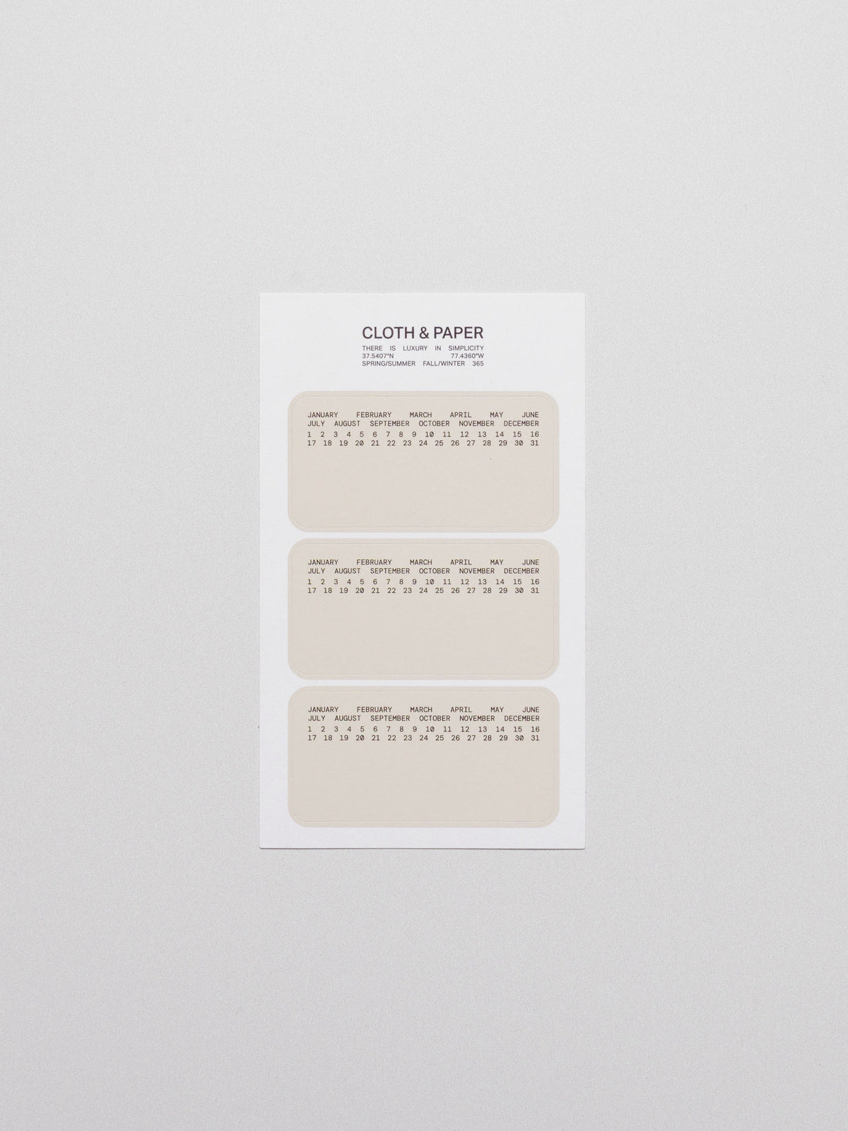Undated calendar stickers displayed on a neutral background.