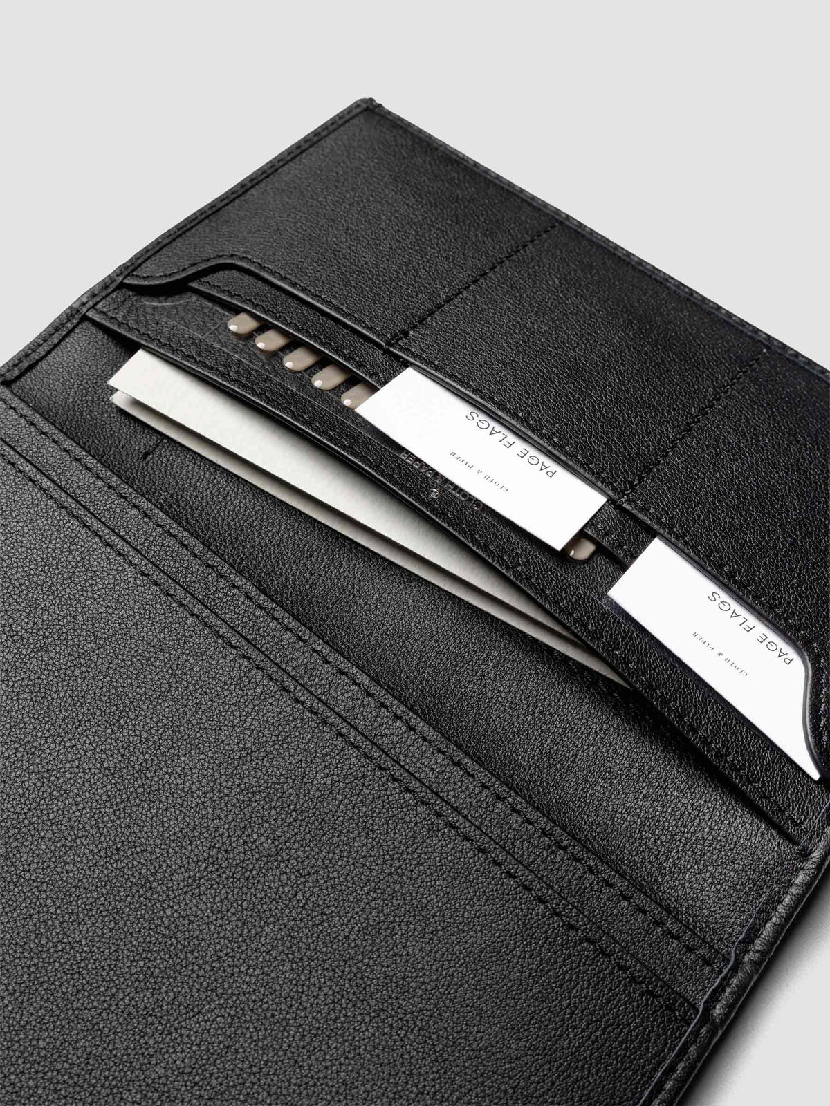 Close-up of Cloth & Paper products inside Nomada Wallet pockets in Padrillo