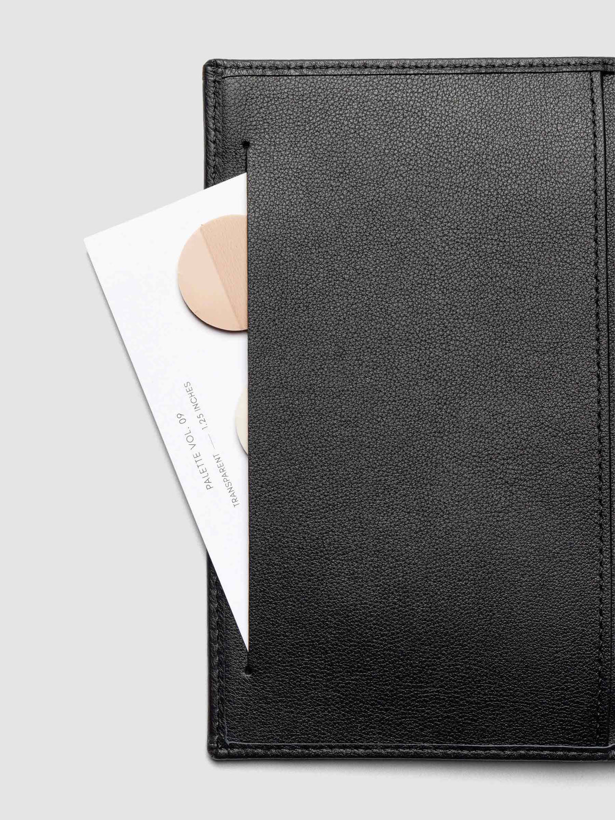 Close-up of Nomada Wallet slit pocket in Padrillo with page flags inside