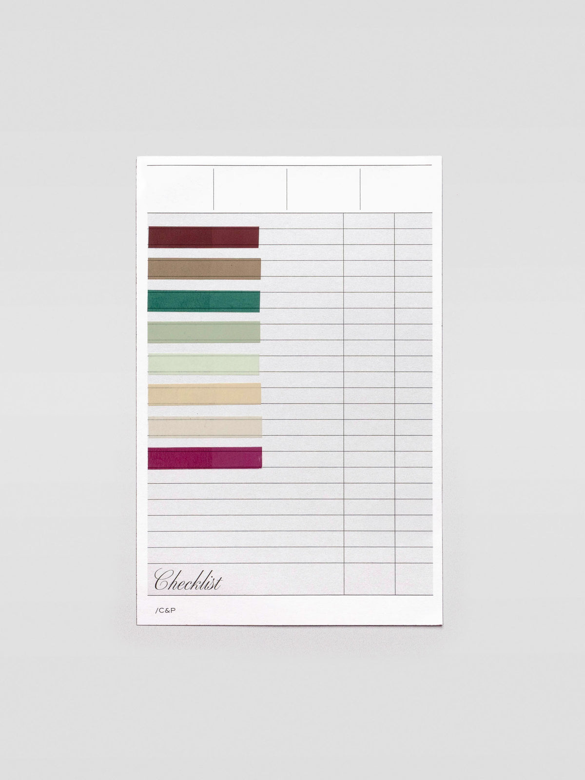 Short page pins in volume 2, a set of 8 page pin solid colors including brown, grey, greens, beige, and red shown individually on paper.