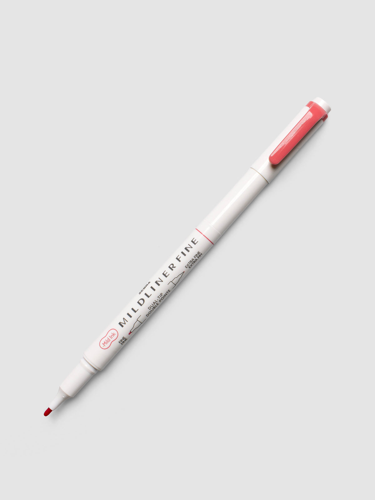 Zebra Mildliner Dual-Tip Fineliner in red with cap removed showing fine bullet tip