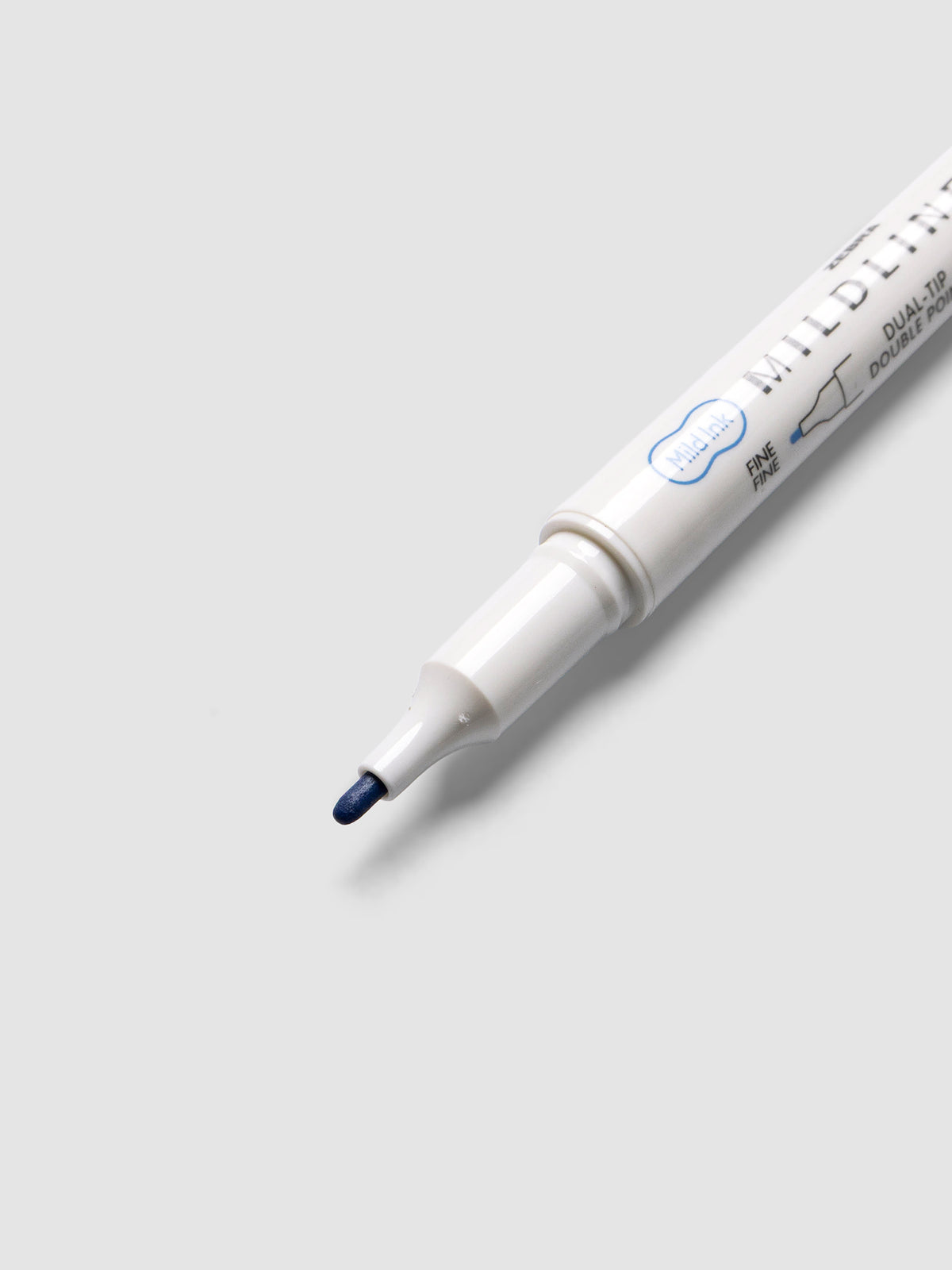 Close-up of Zebra Mildliner Dual-Tip Fineliner fine bullet tip in dark blue