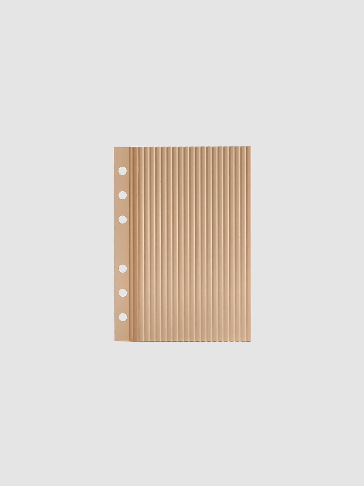 Bisque fluted planner dashboard in A6 size, six ring punch, shown flat on a grey background.