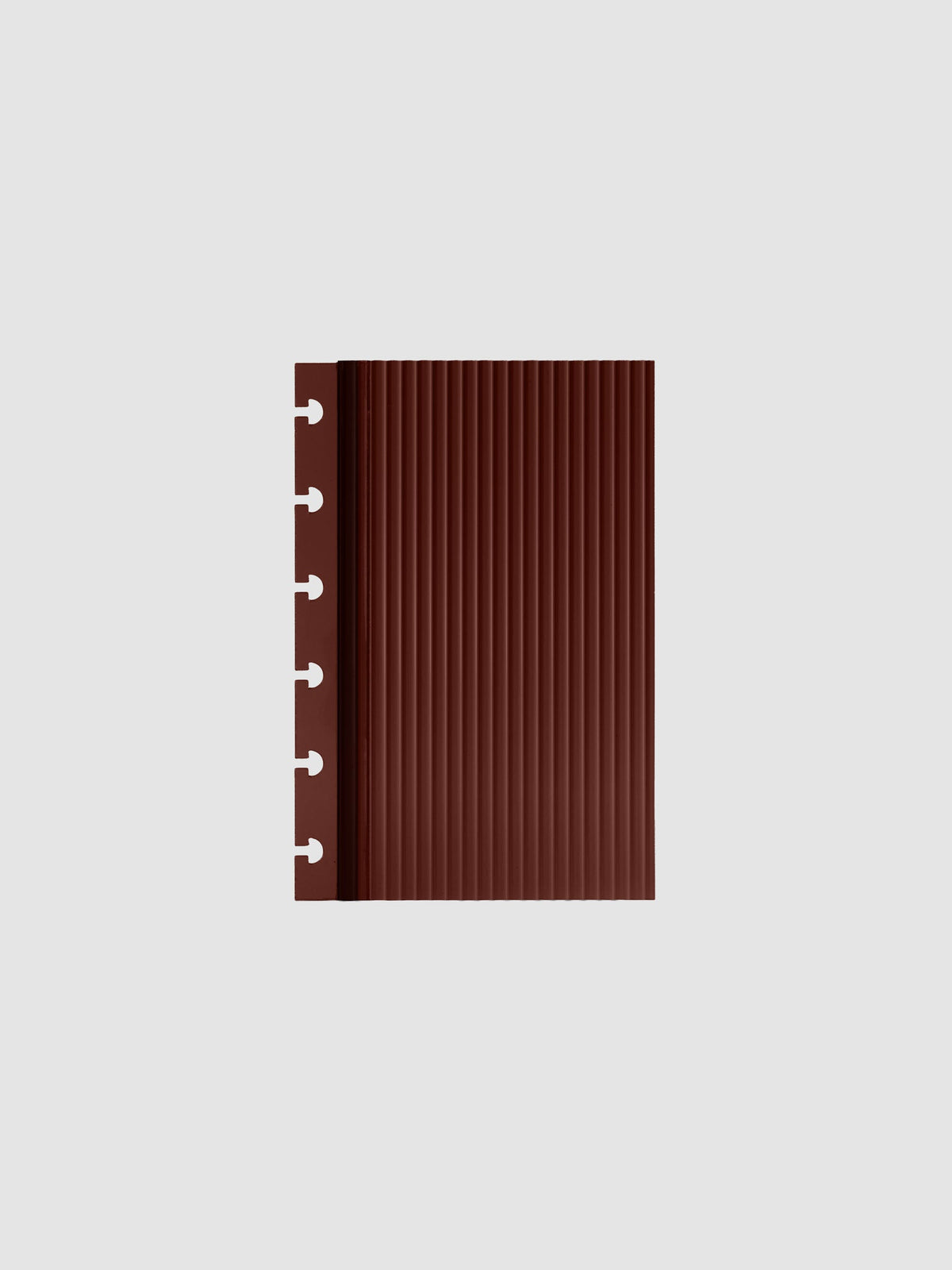 Bordeaux fluted planner dashboard in CP Petite size, six disc punch, shown flat on a grey background.