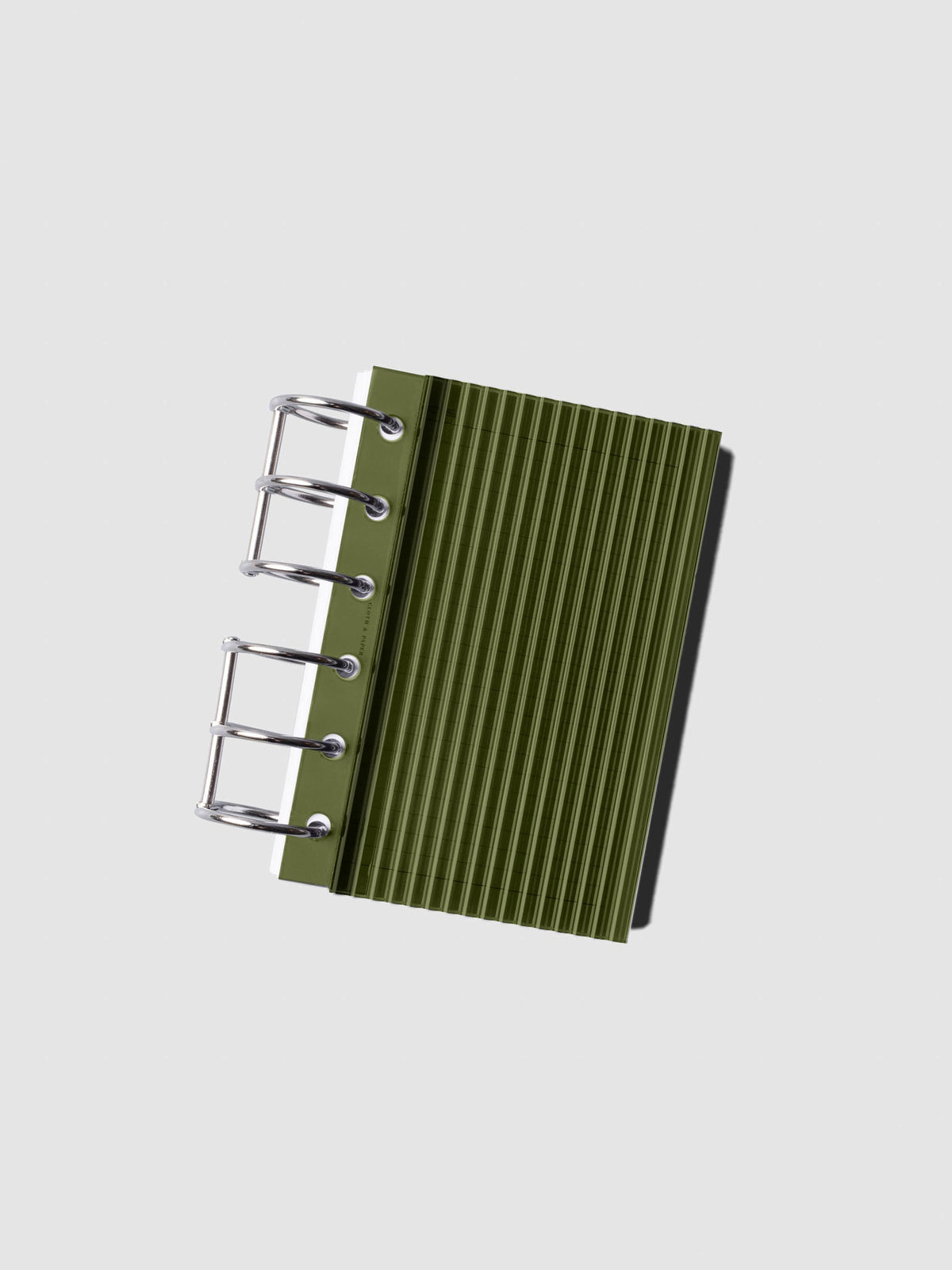 Olive fluted planner dashboard in Pocket size shown on silver six rings at an angle, no cover.