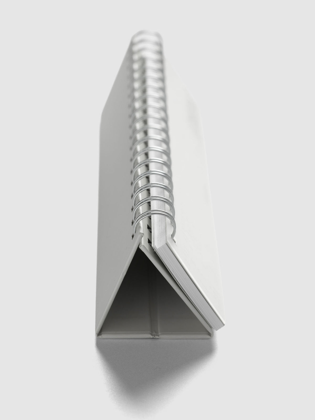 2026 Spiral Desk Calendar shown standing from the side.