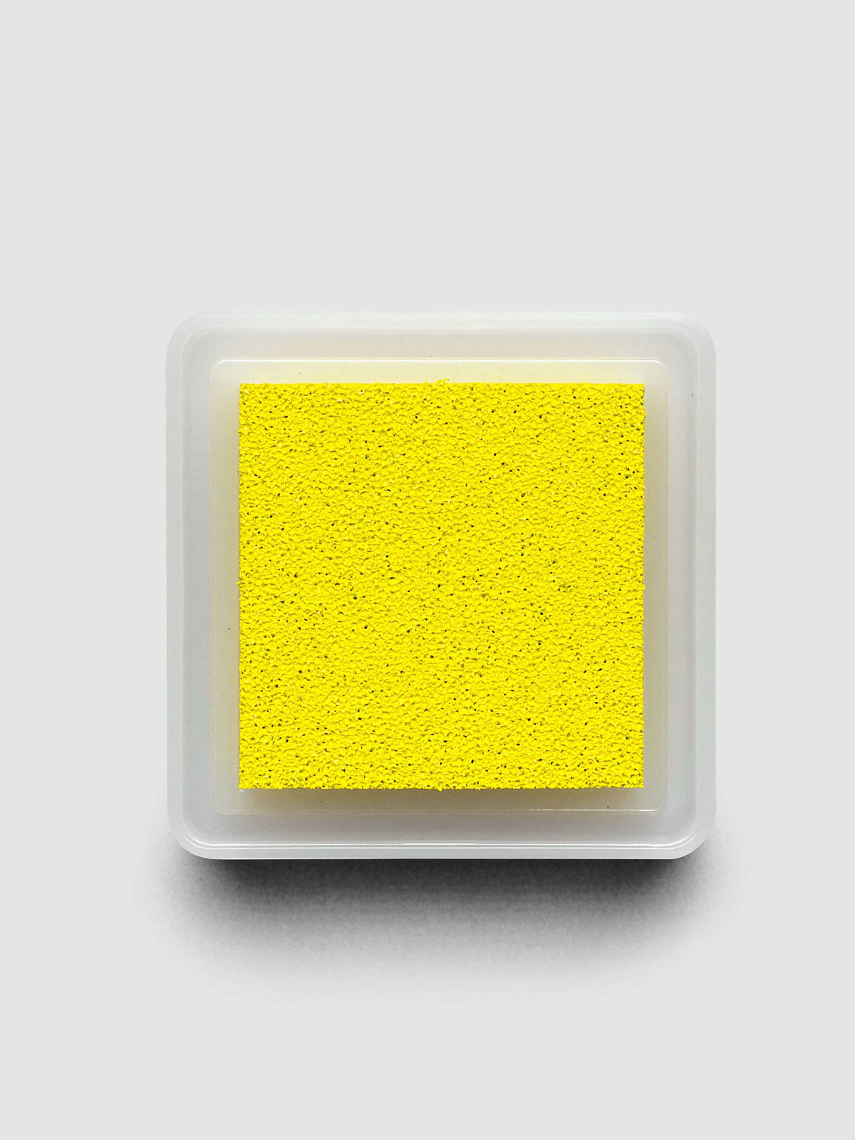 Artnic Stamp Ink Pad in citron seen from the side with cover on