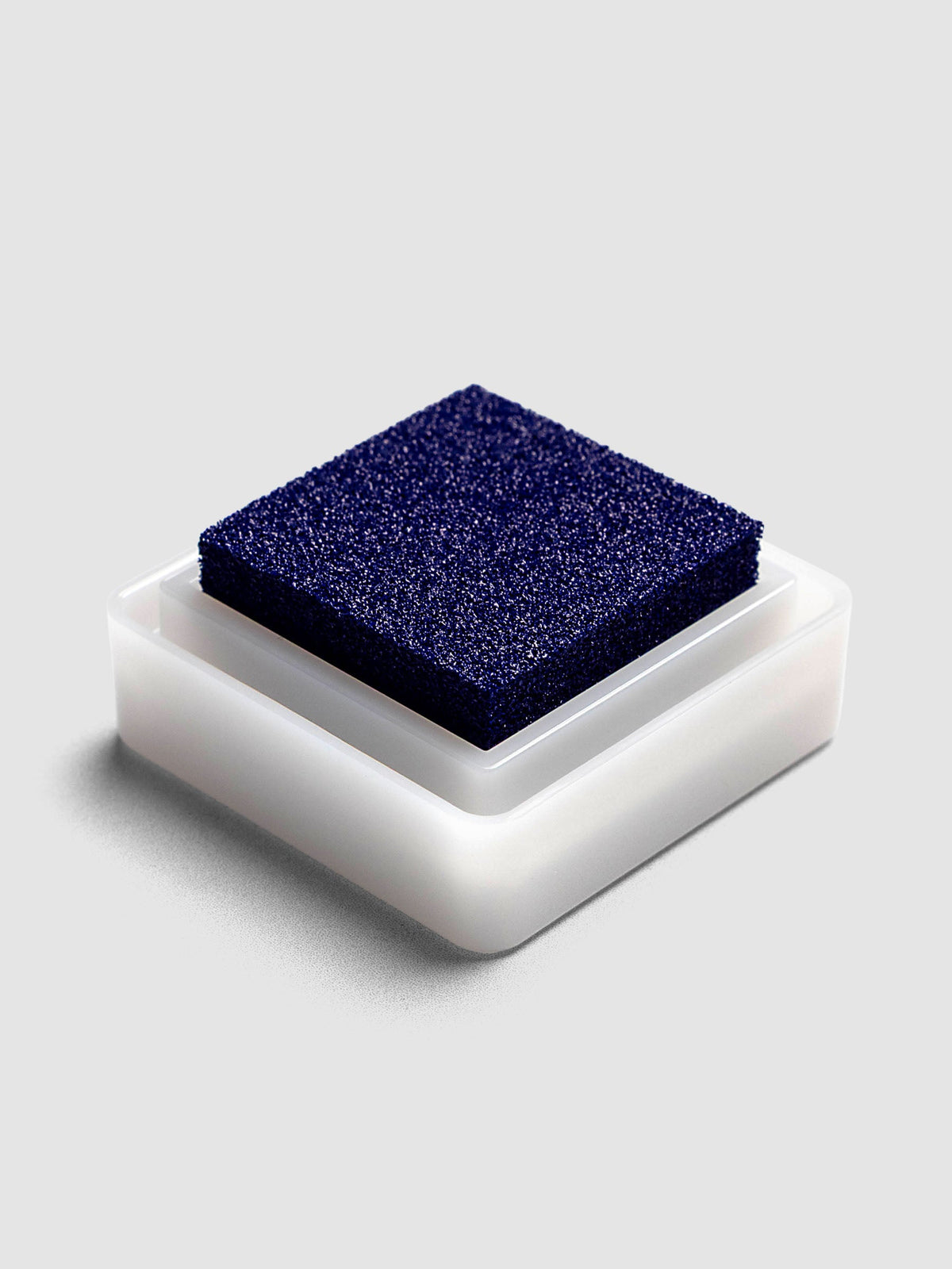 Artnic Stamp Ink Pad in indigo seen from the side with cover removed