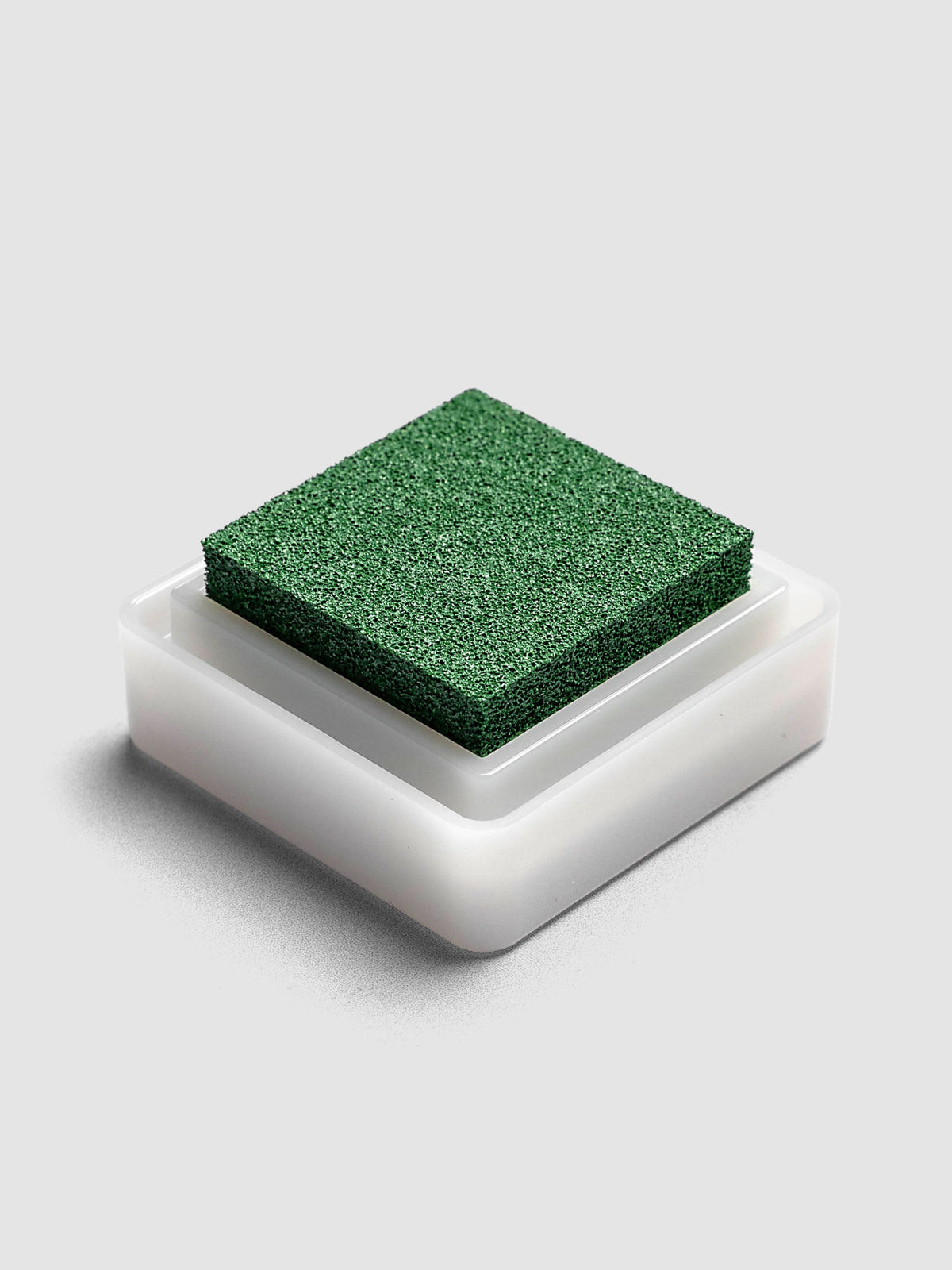 Artnic Stamp Ink Pad in olive seen from the side with cover removed