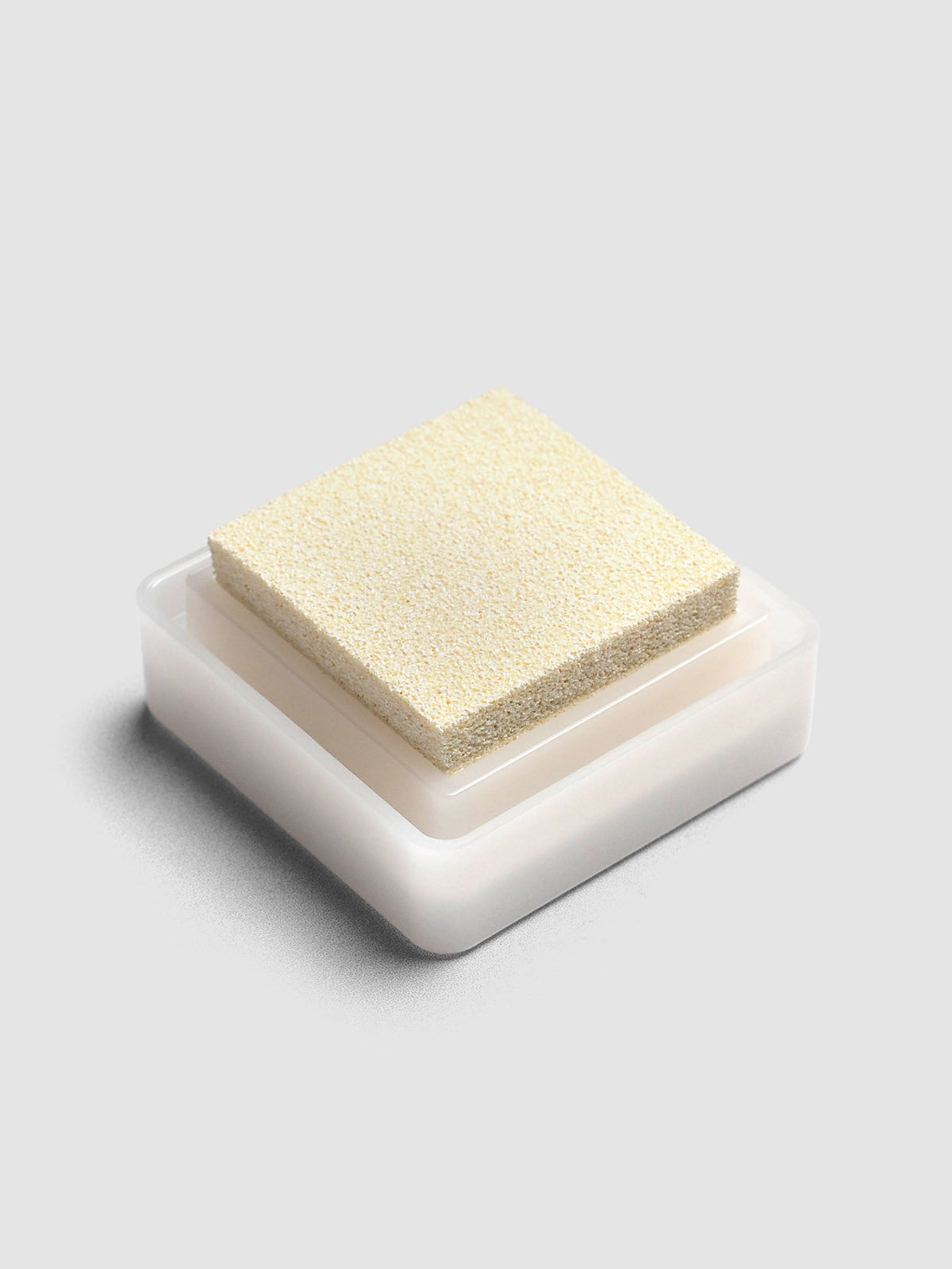 Artnic Stamp Ink Pad in white seen from the side with cover on