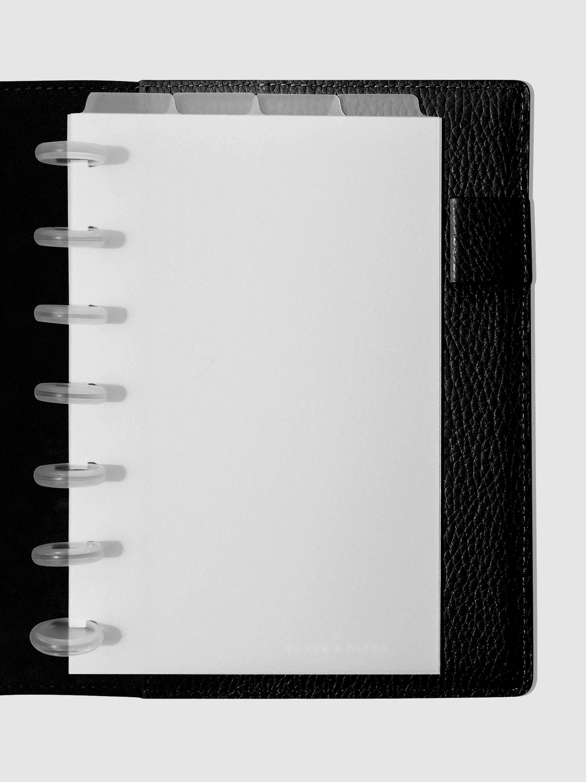 HP Mini  Dividers in use inside a black leather planner.