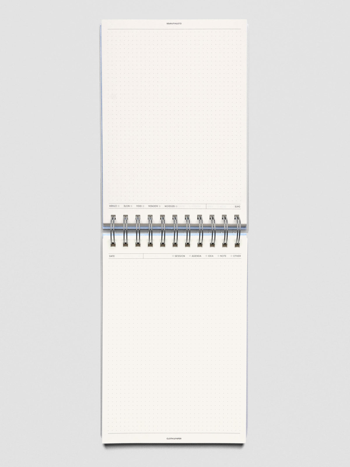 Break Room top spiral notebook shown open to reveal pages with headers and graph pages.