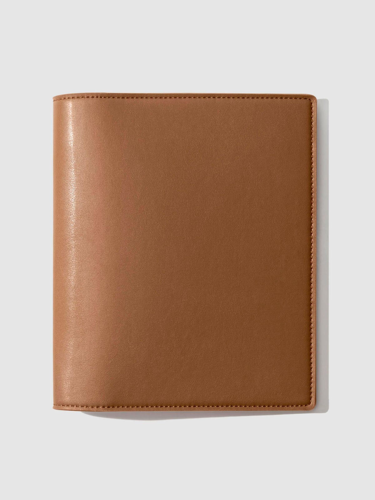 Folio displayed on a neutral background. Color shown is clay brown. 